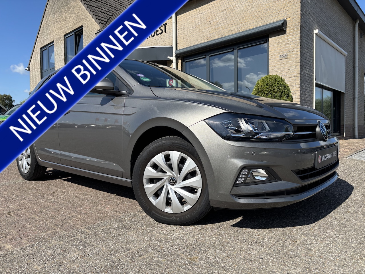 Volkswagen Polo - 5DRS 1.0 TSI Comfortline Navigatie / Carplay / Parkeersensors - AutoWereld.nl