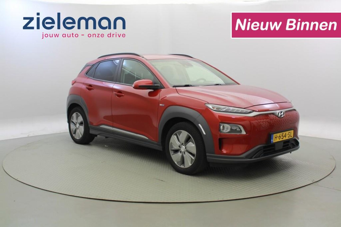 Hyundai Kona Electric - Premium 64 kWh - Carplay, Camera, Leer, Stoelverw. - AutoWereld.nl