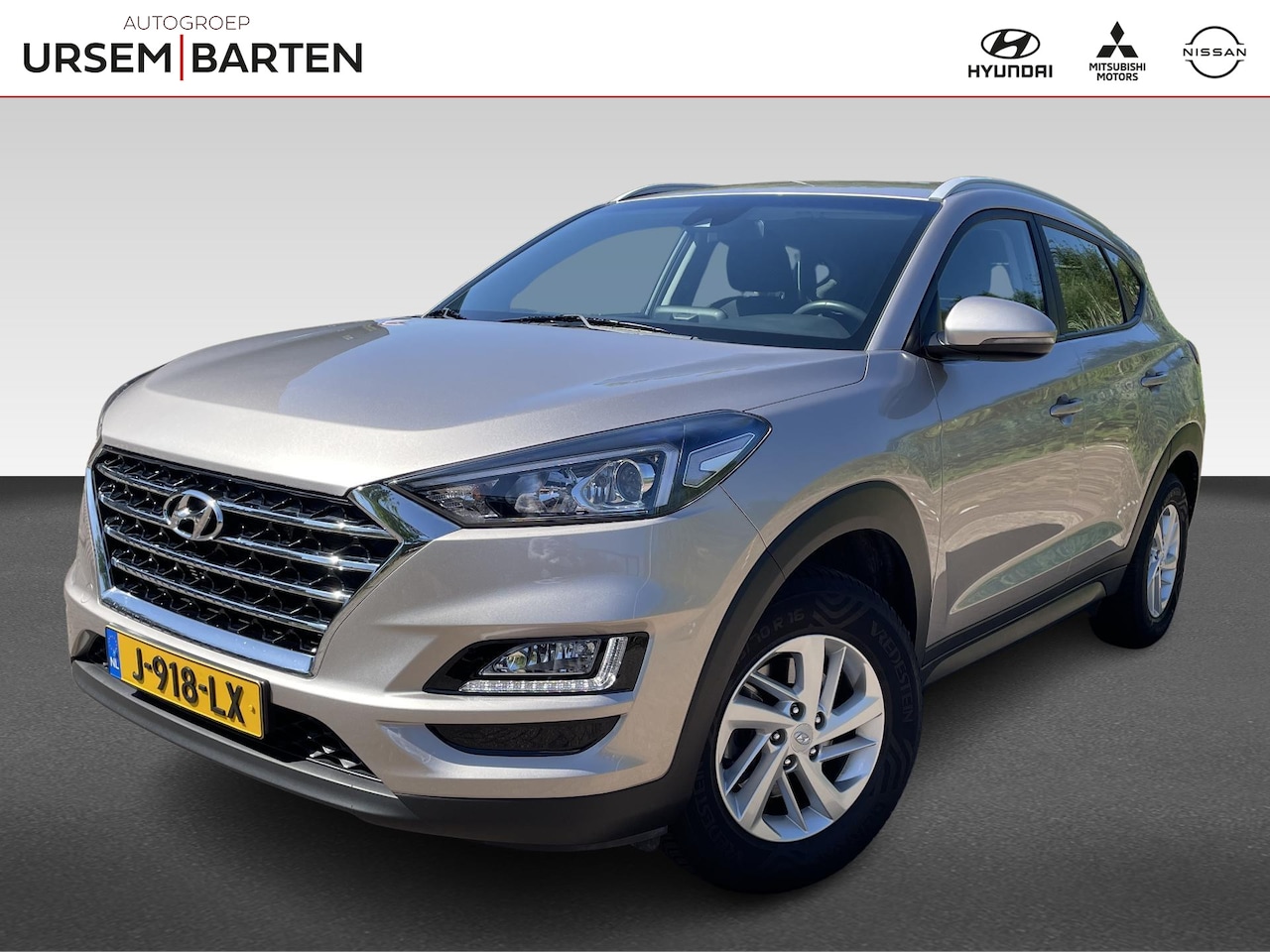 Hyundai Tucson - 1.6 GDI Comfort  | navigatie | cruise control | climate control | trekhaak | achteruitrijc - AutoWereld.nl