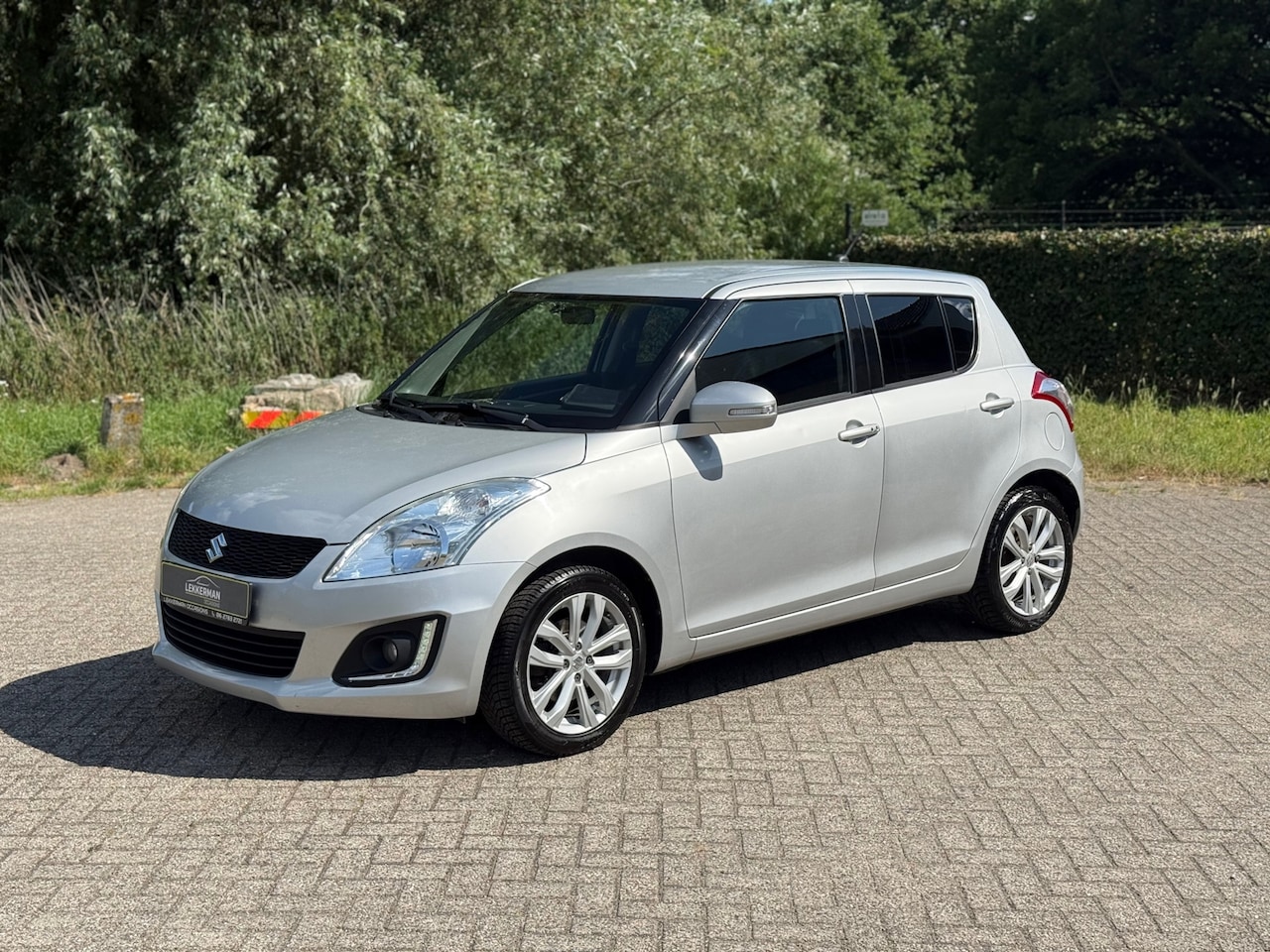 Suzuki Swift - 1.2 Exclusive EASSS CRUISE I KEYLESS I VOLL OPTIES - AutoWereld.nl