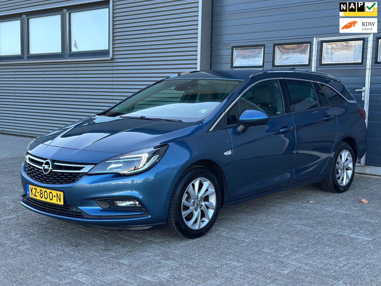 Opel Astra Sports Tourer - 1.0 Innovation NWE APK - ALLE OPTIES - NETTE AUTO - NAVI - PDC!! - AutoWereld.nl