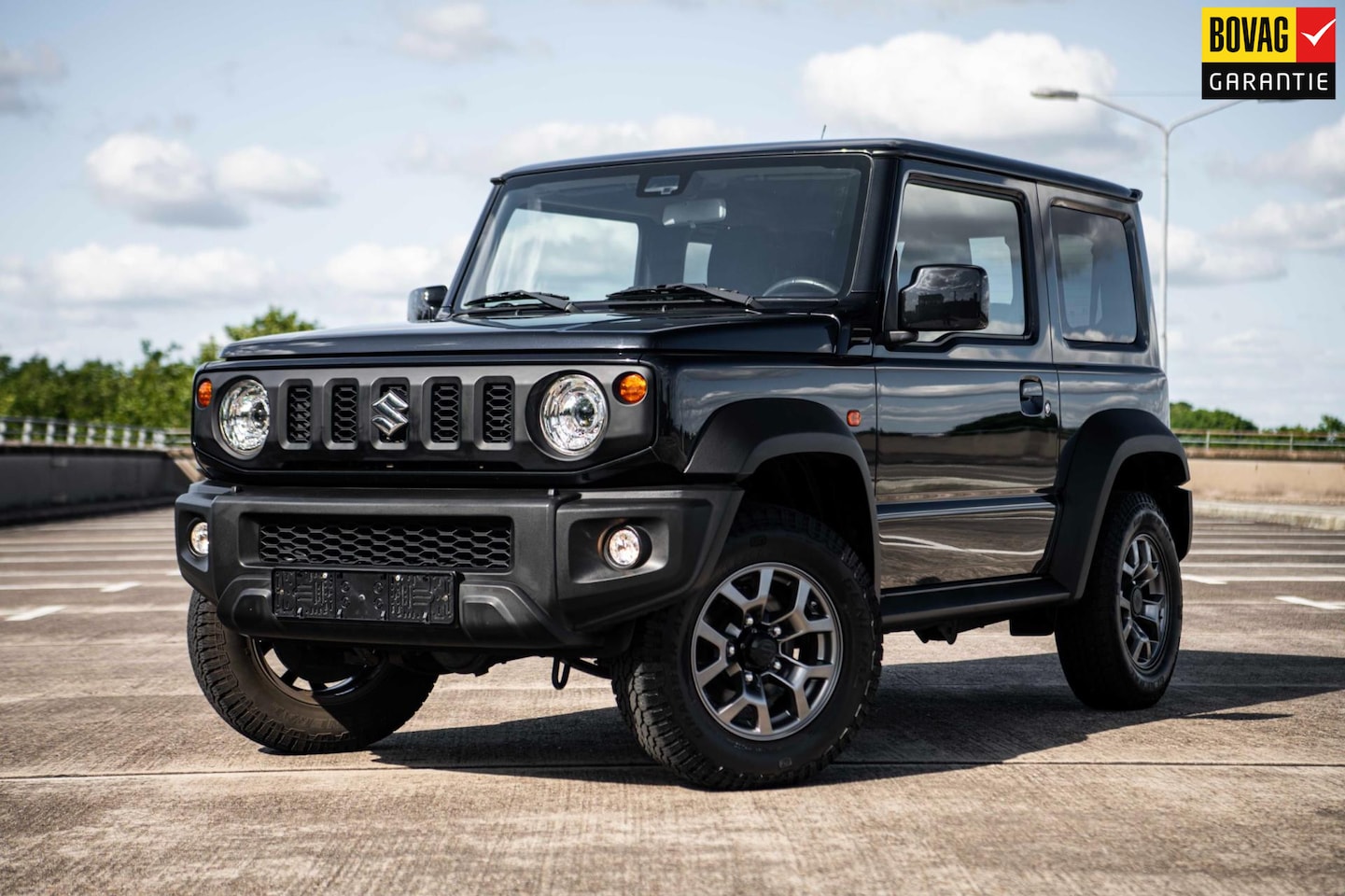 Suzuki Jimny - 1.5 Stijl | 4 Persoons | Airco/Clima | Cruise Control | Navigatie | Stoelverwarming | Trek - AutoWereld.nl