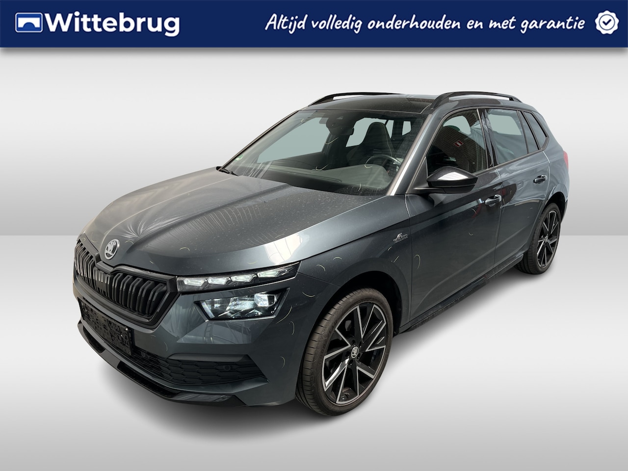 Skoda Kamiq - 1.0 TSI Monte Carlo / AUTOMAAT/ PANO/ TREKHAAK/ PARK. SENSOREN/ STUUR-STOELVERWARM./ CRUIS - AutoWereld.nl