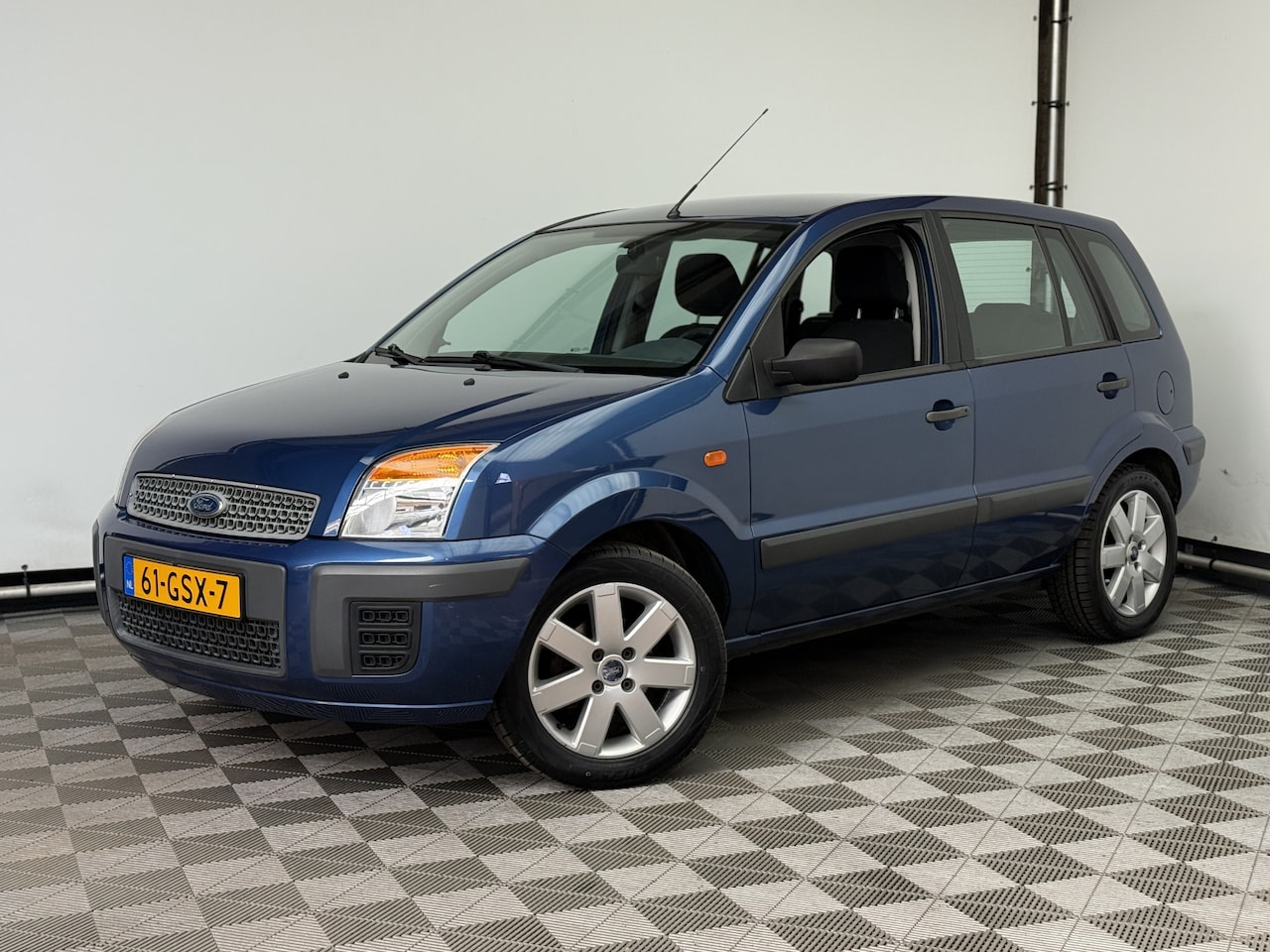 Ford Fusion - 1.4-16V Cool & Sound Airco Trekhaak 1e Eigenaar - AutoWereld.nl