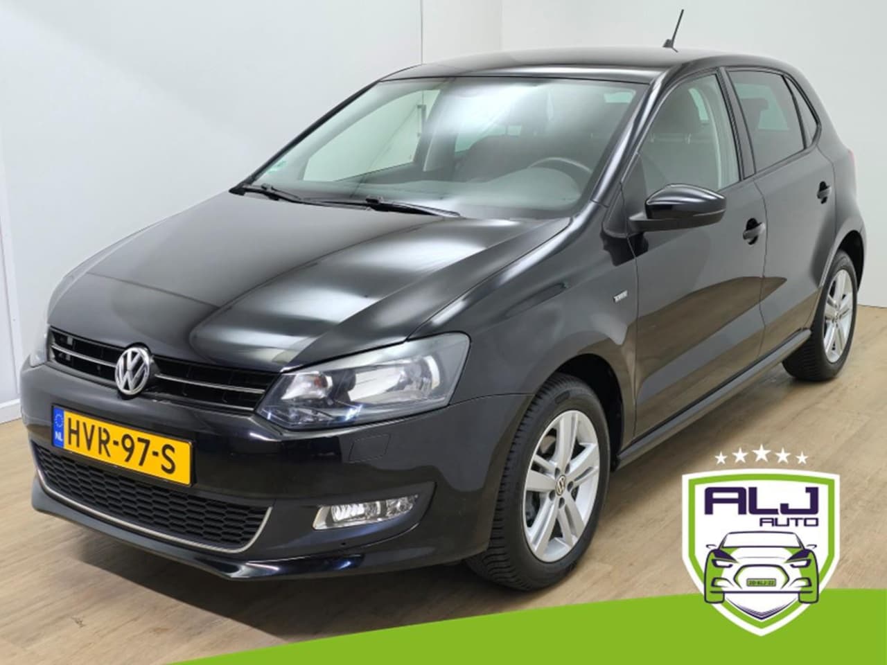Volkswagen Polo - Occasion 1.2 TSI in zwart met cruisecontrol en sportieve look | Tweedehands Volkswagen Pol - AutoWereld.nl