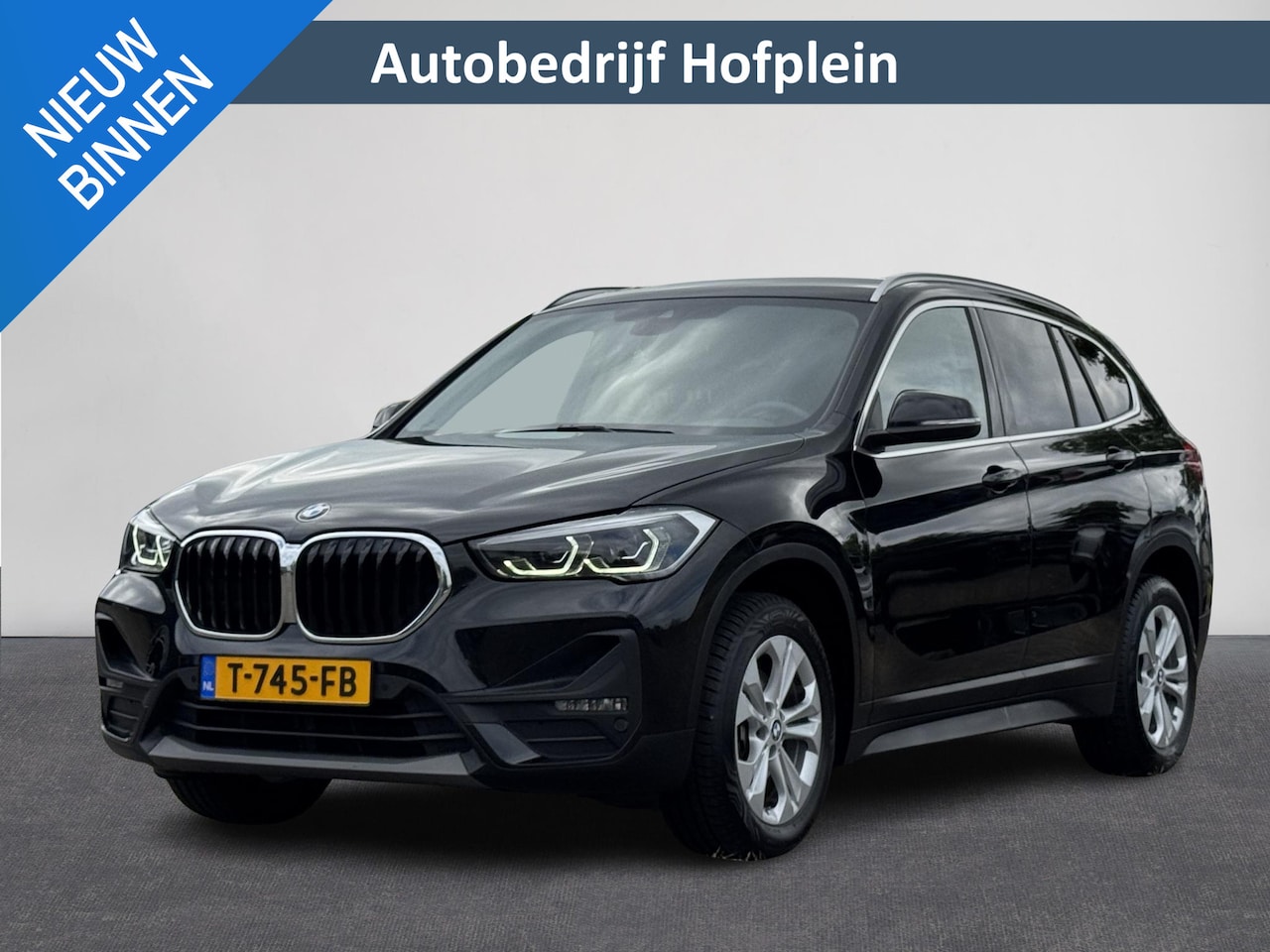 BMW X1 - sDrive18i High Executive | Automaat | Cruise | Camera | Navi | Stoelverwarming | Clima ( V - AutoWereld.nl