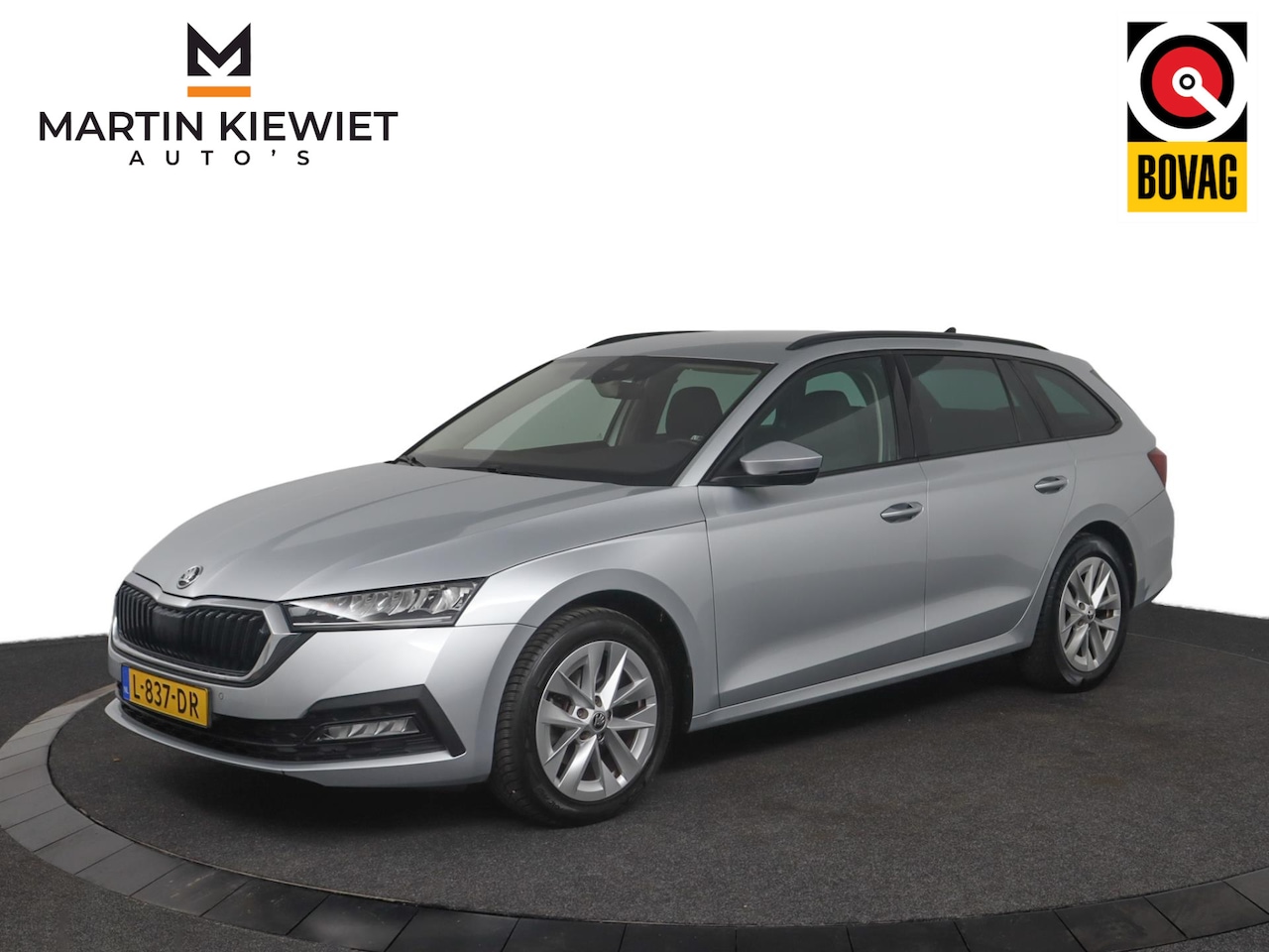 Skoda Octavia Combi - 1.0 e-TSI Business Edition Automaat|Camera|Trekhaak|Stoelverwarming - AutoWereld.nl