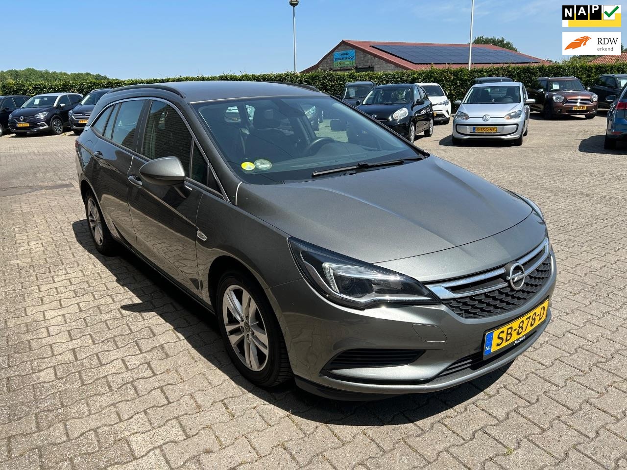 Opel Astra Sports Tourer - 1.6 CDTI Business+ EXPORT - AutoWereld.nl