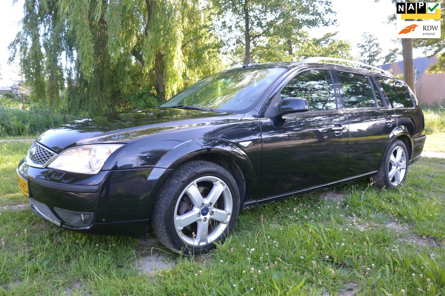 Ford Mondeo Wagon - 1.8-16V Platinum*airco*cruise*leer*navigatie - AutoWereld.nl