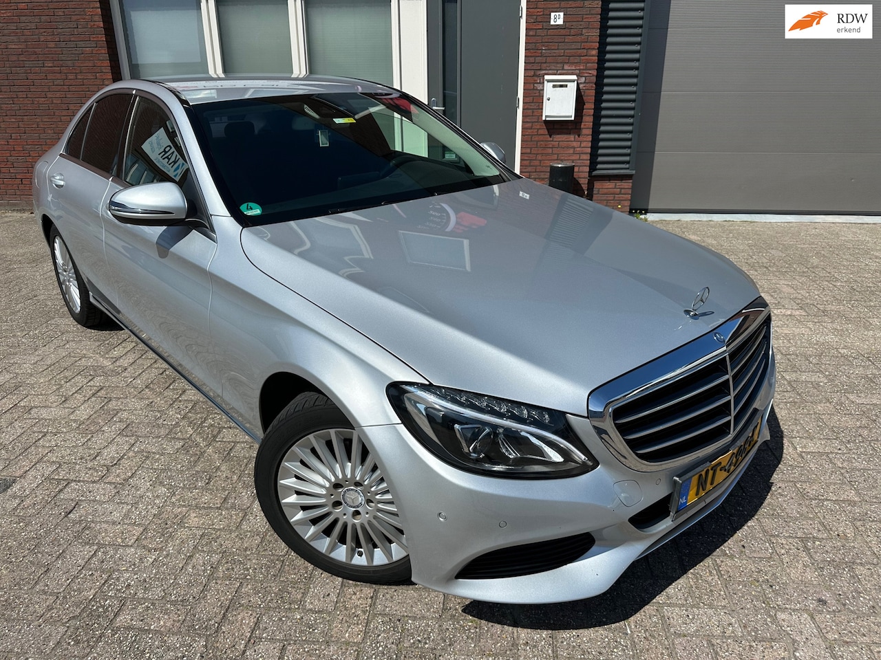 Mercedes-Benz C-klasse - 180 Prestige / Leder / Navi / PDC / Clima / Cruise - AutoWereld.nl