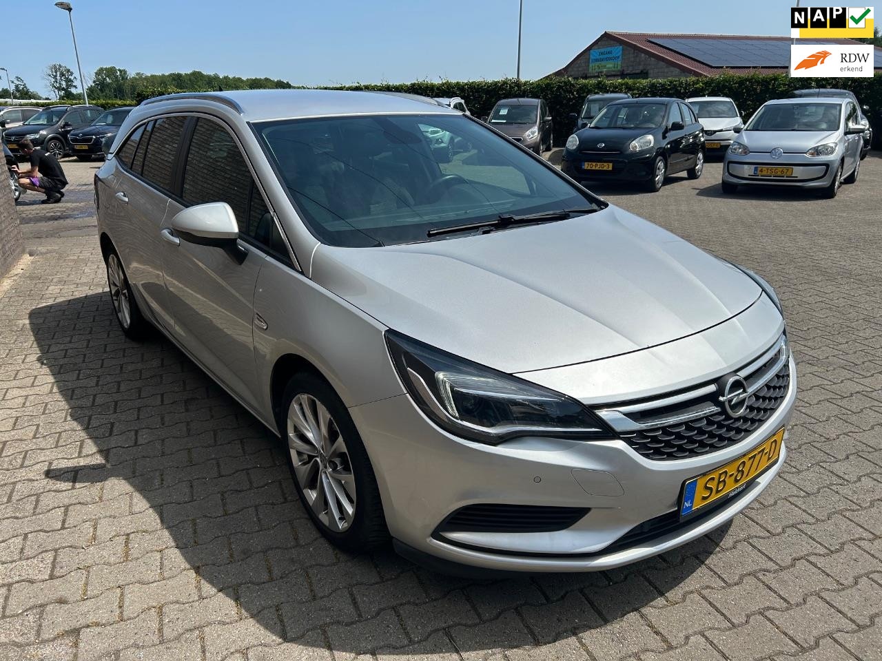 Opel Astra Sports Tourer - 1.6 CDTI Business+ EXPORT - AutoWereld.nl
