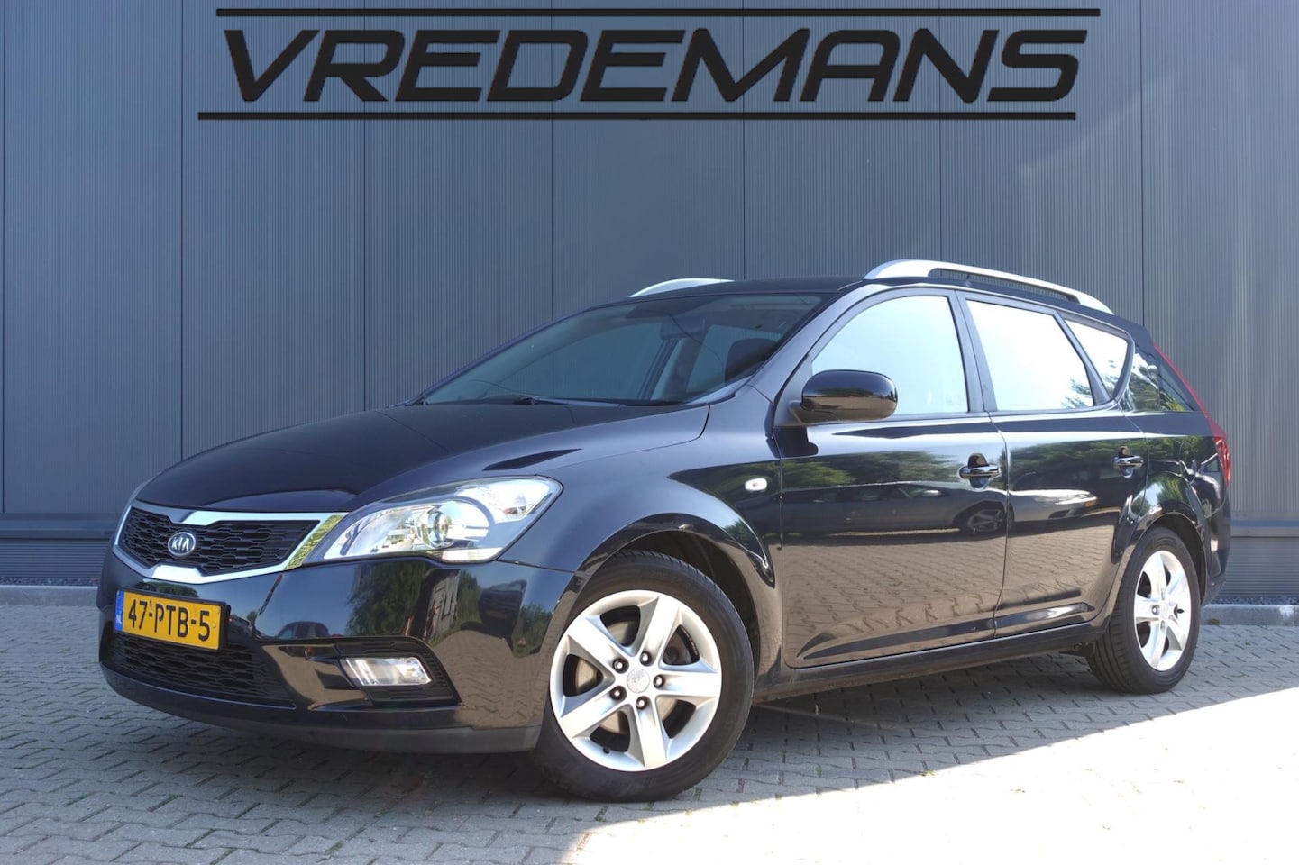 Kia Cee'd Sporty Wagon - 1.4 CVVT Seven 1.4 CVVT Seven - AutoWereld.nl