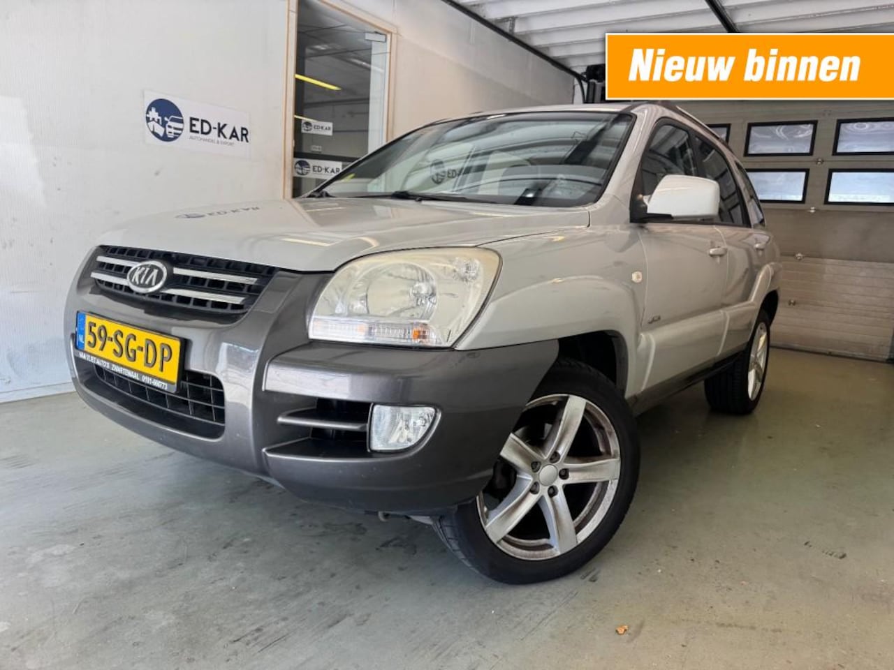 Kia Sportage - 2.7 V6 Adventure 4WD leer clima distr. verv. nette auto NAP APK 6-2025 - AutoWereld.nl