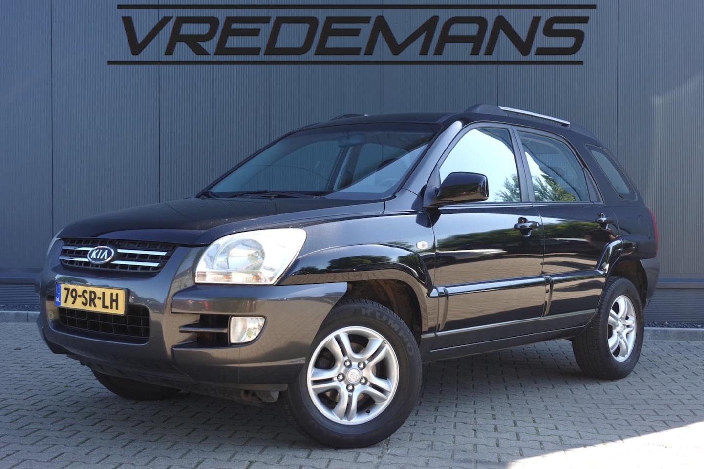 Kia Sportage - 2.0 CVVT Executive 2.0 CVVT Executive - AutoWereld.nl