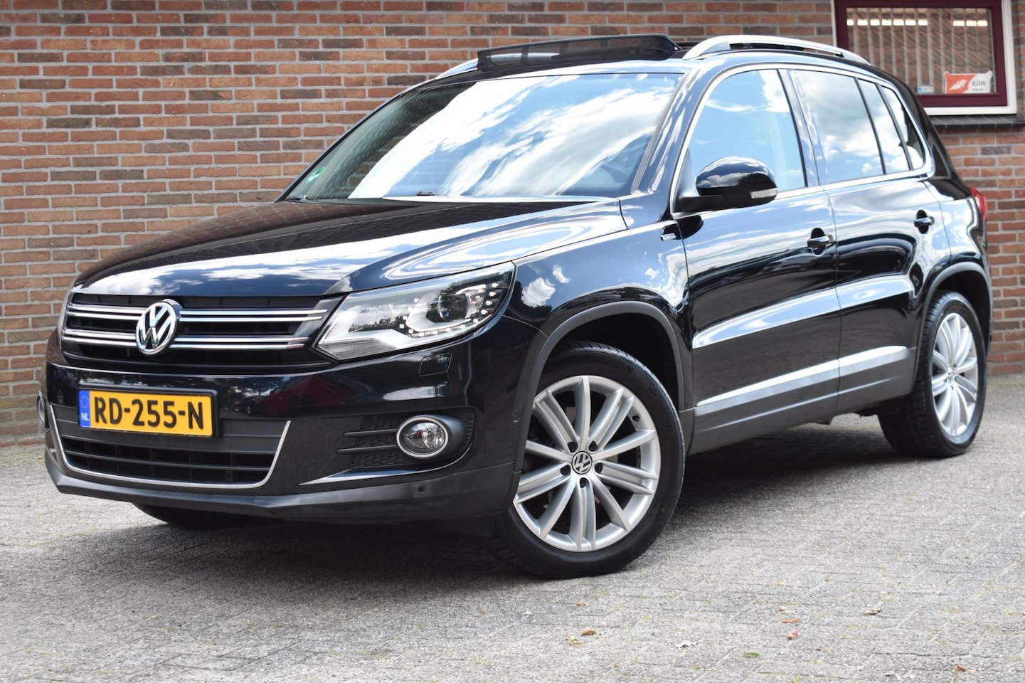 Volkswagen Tiguan - 1.4 TSI Edition '14 Xenon Pano Clima Cruise Inruil Mogelijk - AutoWereld.nl