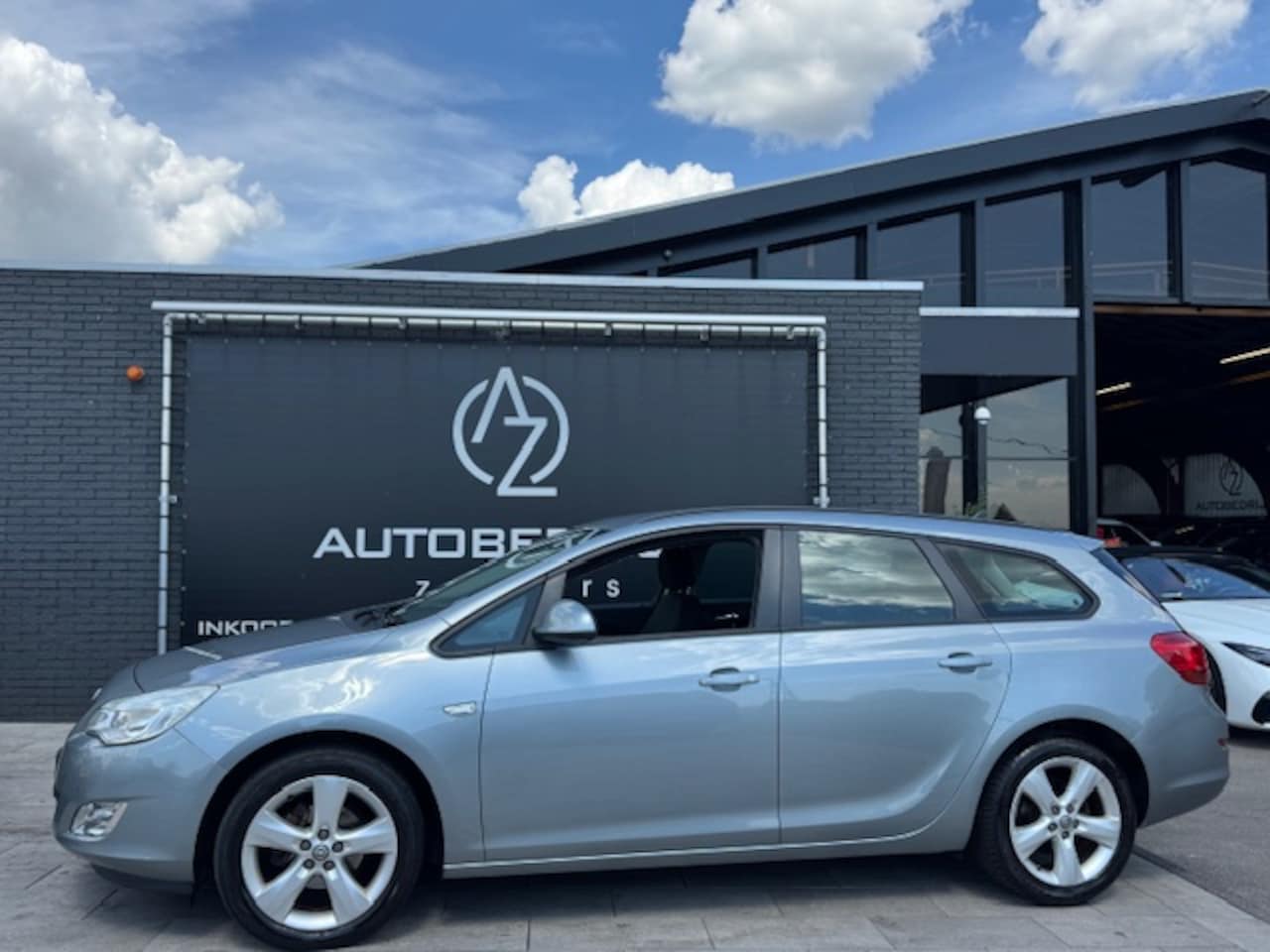 Opel Astra Sports Tourer - 1.4 Turbo Edition 1.4 Turbo Edition - AutoWereld.nl
