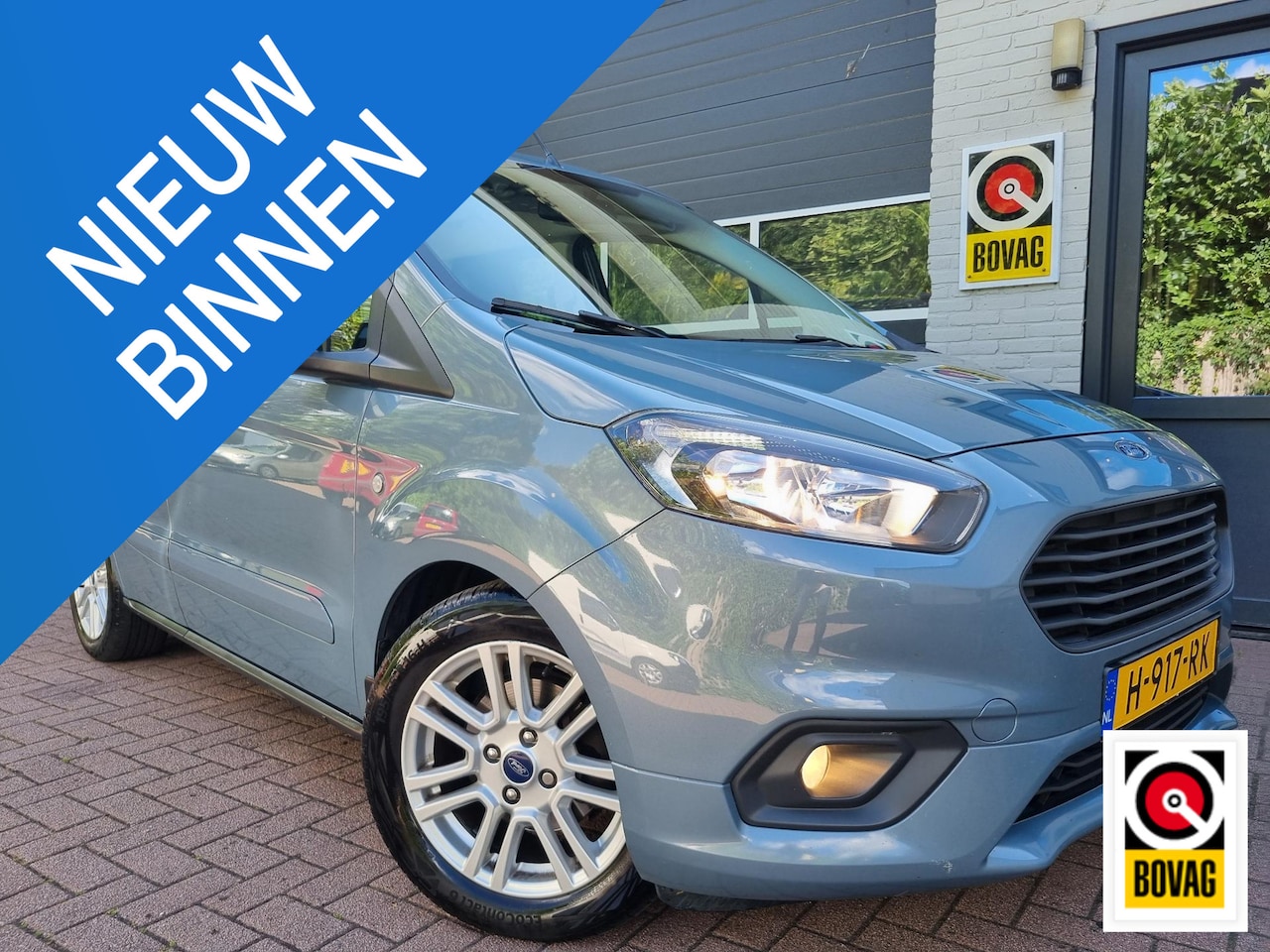 Ford Tourneo Courier - 1.0 Titanium AIRCO ECC / CRUISE / TREKHAAK - AutoWereld.nl