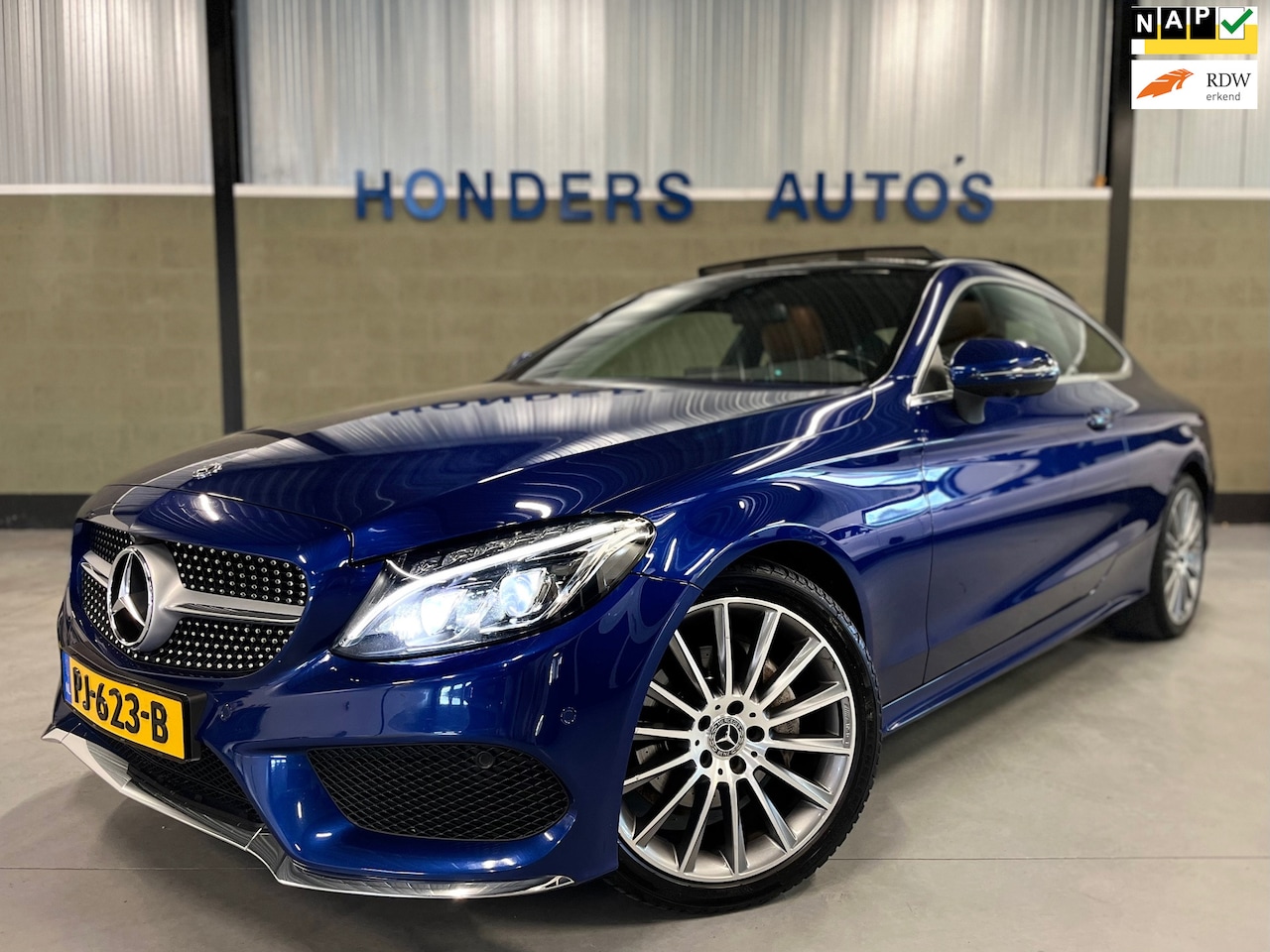 Mercedes-Benz C-klasse Coupé - 200 Premium Plus AMG LINE I PANO I BURMESTER I 360' CAMERA I MEMORY I NAP I LEDER I AMG VE - AutoWereld.nl