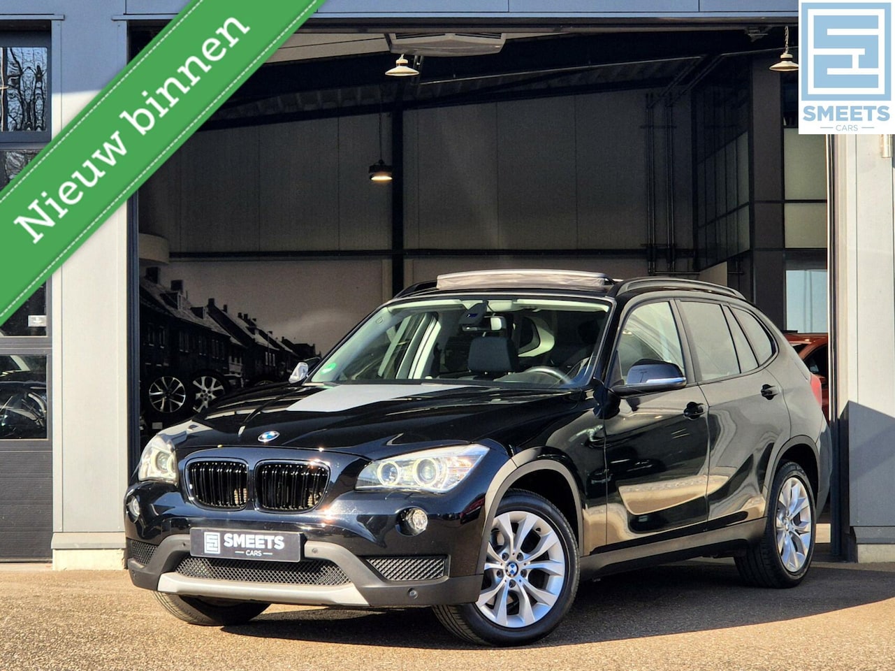 BMW X1 - sDrive18i Executive Black Line |Navi|Pano|Xenon|Clima - AutoWereld.nl