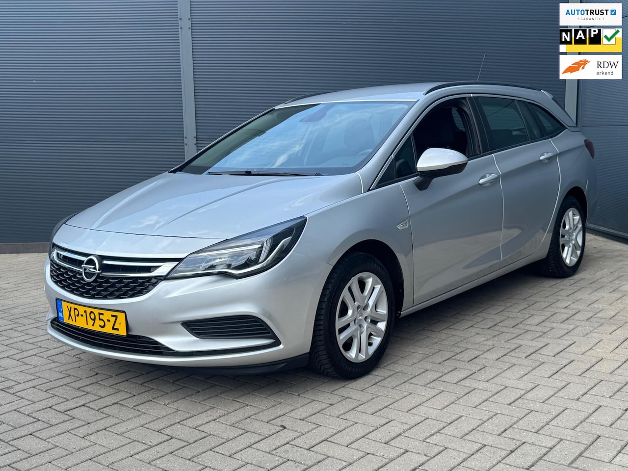 Opel Astra Sports Tourer - 1.0 Turbo / Navi / Nap / Trekhaak - AutoWereld.nl