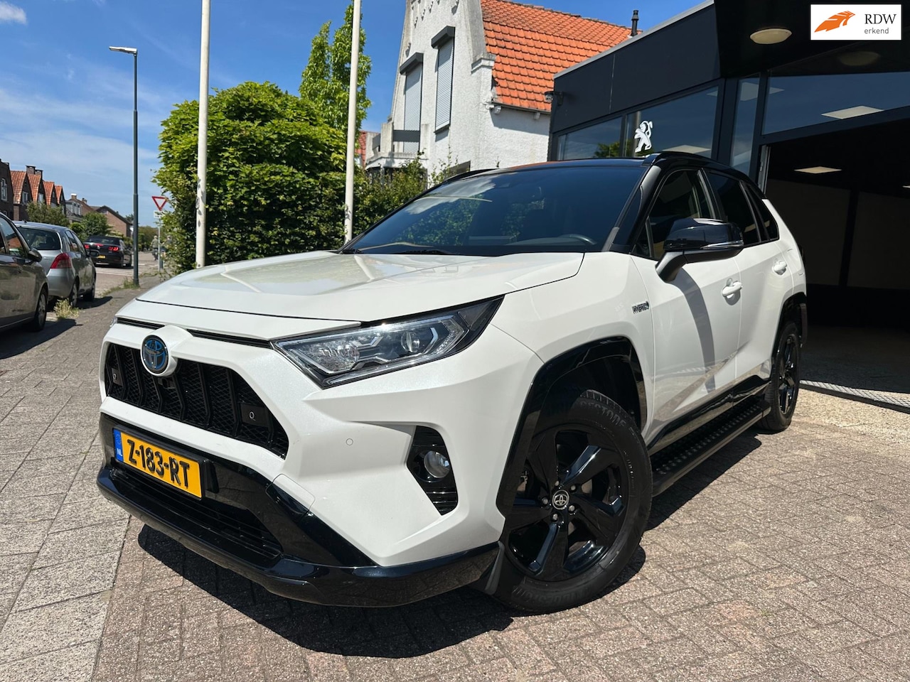 Toyota RAV4 - 2.5 Hybrid AWD Bi-Tone|Leder|Side Bars - AutoWereld.nl