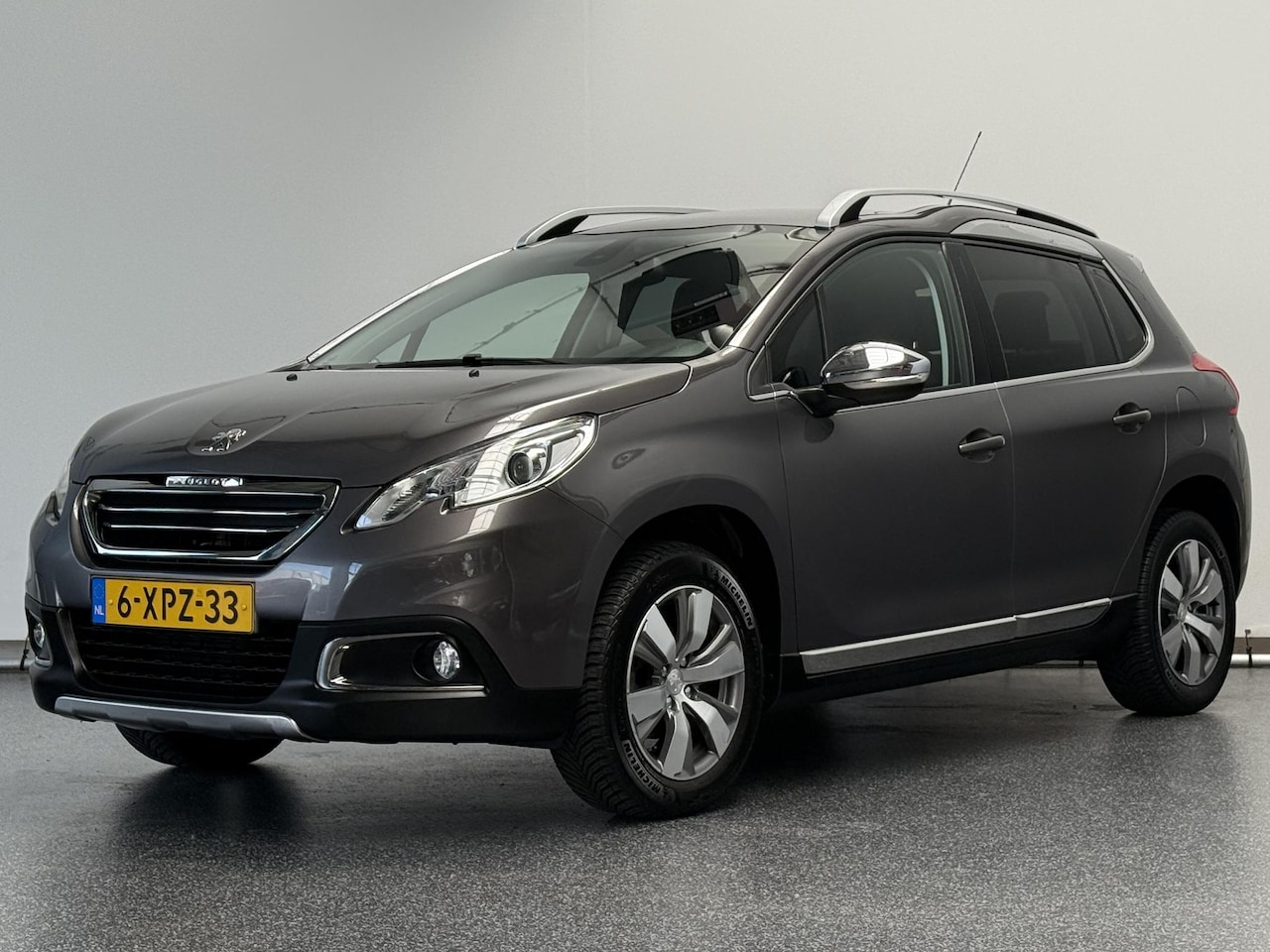 Peugeot 2008 - 1.2 PureTech Allure | Automaat | Panorama | Airco | NL Auto - AutoWereld.nl