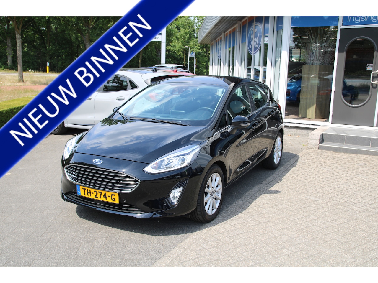 Ford Fiesta - 1.0 EcoBoost 100 PK Titanium TREKHAAK | B&O PREMIUM AUDIO | WINTERPAKKET | - AutoWereld.nl