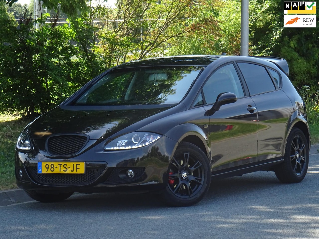 SEAT Leon - 1.6 Sportstyle SPORTUITLAAT NAP/CLIMA/CRUISE/XENON - AutoWereld.nl