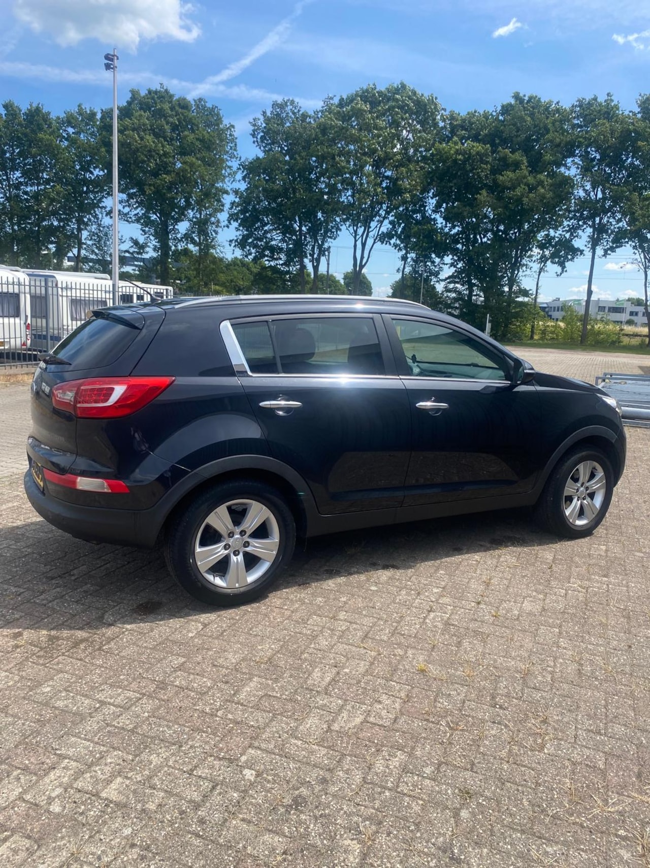 Kia Sportage - 2.0 X-ecutive Plus Pack - AutoWereld.nl