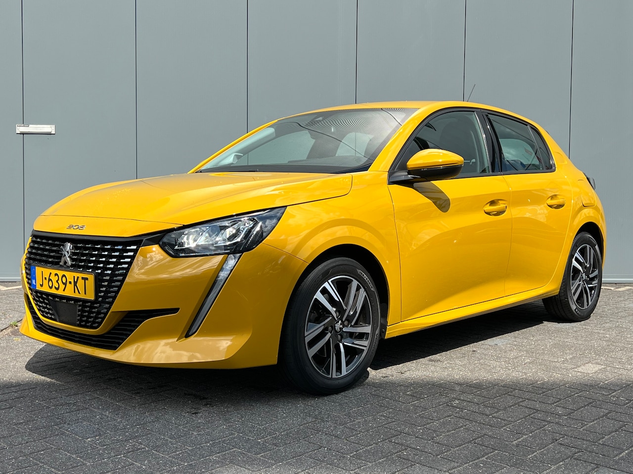 Peugeot 208 - 1.2 100pk Allure | Climate control | Carplay | Leder | Cruise control | Navigatie | Parkee - AutoWereld.nl