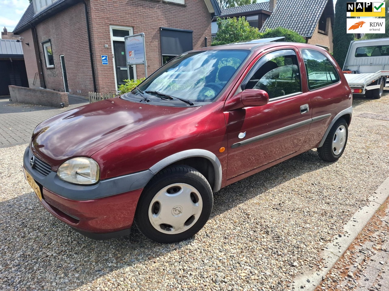 Opel Corsa - 1.2i-16V Strada automaat stuurbekr cv sunroof APK 2-2026 - AutoWereld.nl