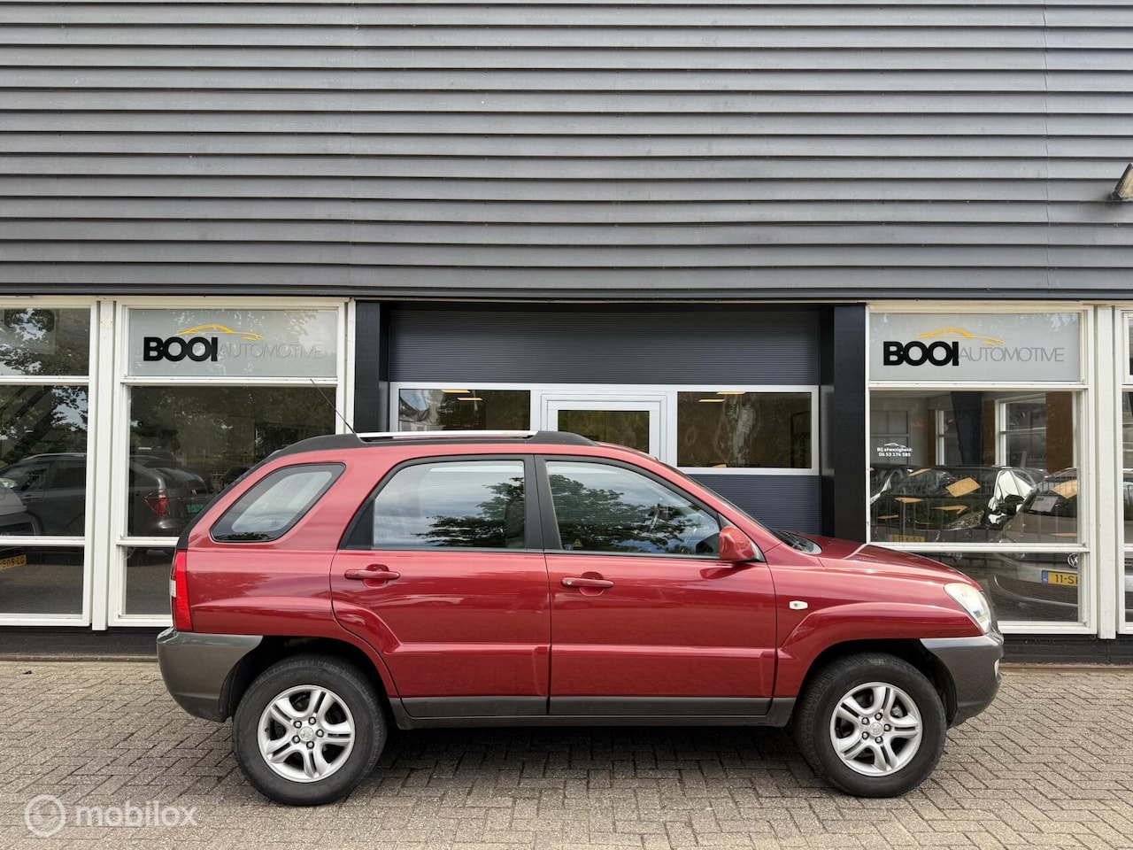 Kia Sportage - 2.0 CVVT Executive 2.0 CVVT Executive - AutoWereld.nl