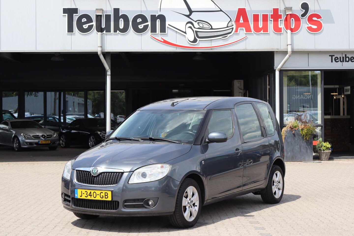 Skoda Roomster - 1.4-16V Navigator Airco, Cruise control, Elektrische ramen, - AutoWereld.nl