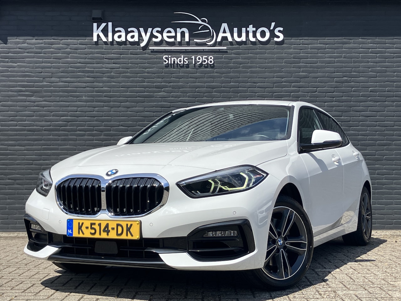 BMW 1-serie - 118i Executive Edition 140 pk | dealer onderhouden | navigatie | sportstoelen | led koplam - AutoWereld.nl