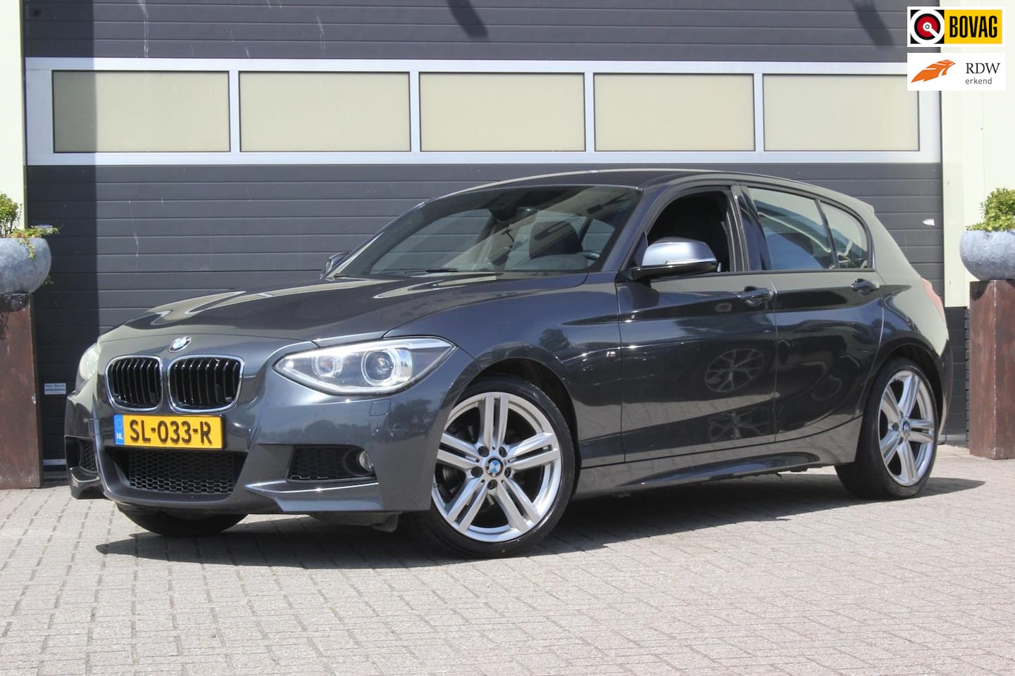 BMW 1-serie - 116i M Sport Edition | 18 inch | Navigatie | - AutoWereld.nl