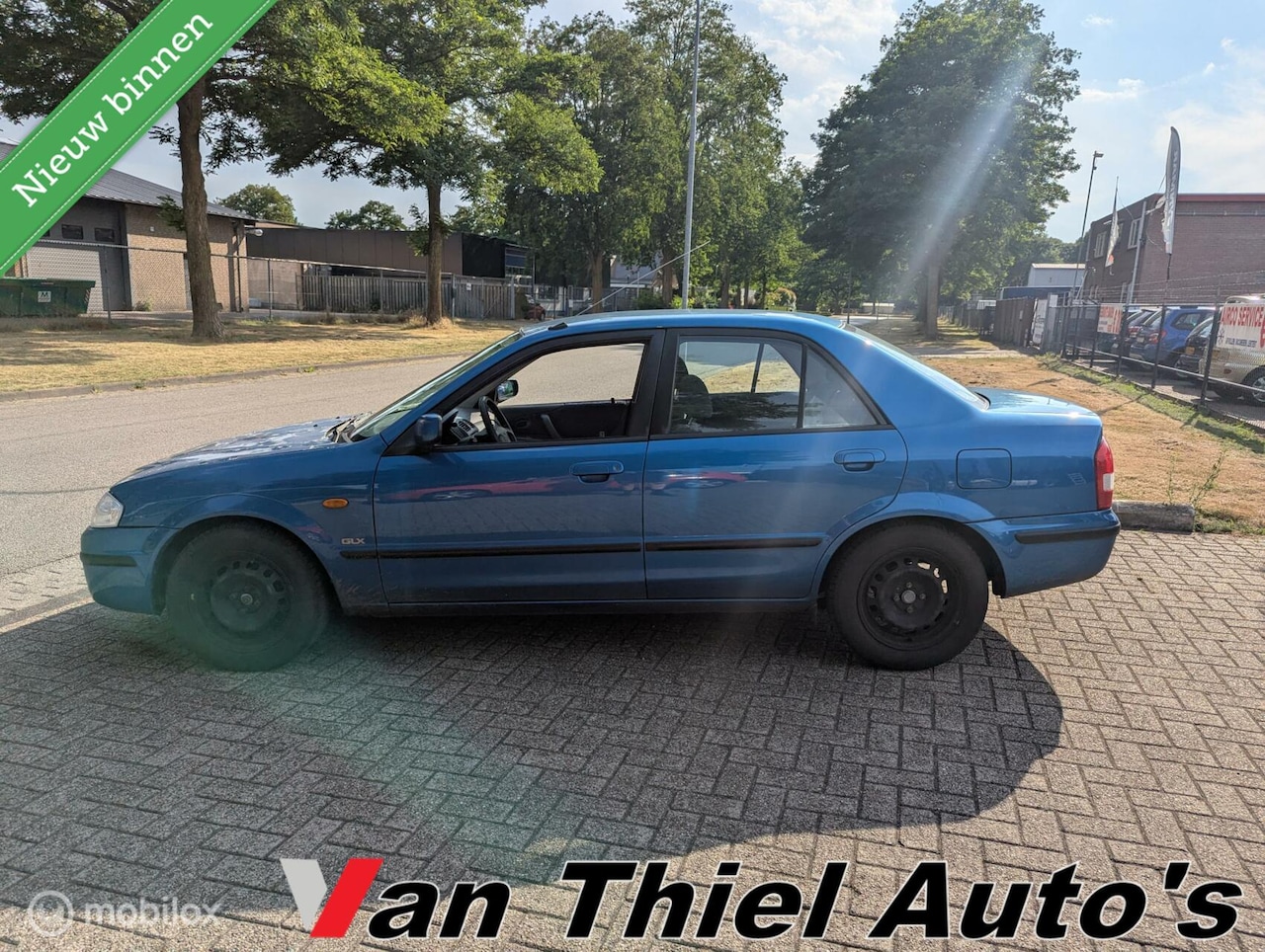 Mazda 323 - 1.5i GLX ijskoude airco sedan el.ramen - AutoWereld.nl