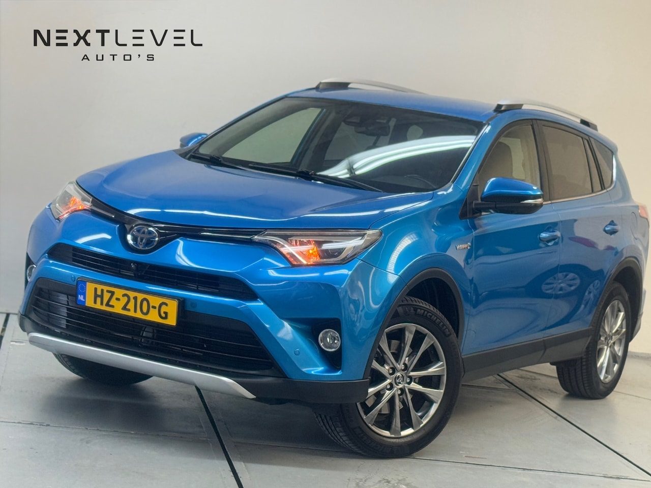 Toyota RAV4 - 2.5 Hybrid AWD Executive Business Trekhaak 360 Vol Leder - AutoWereld.nl