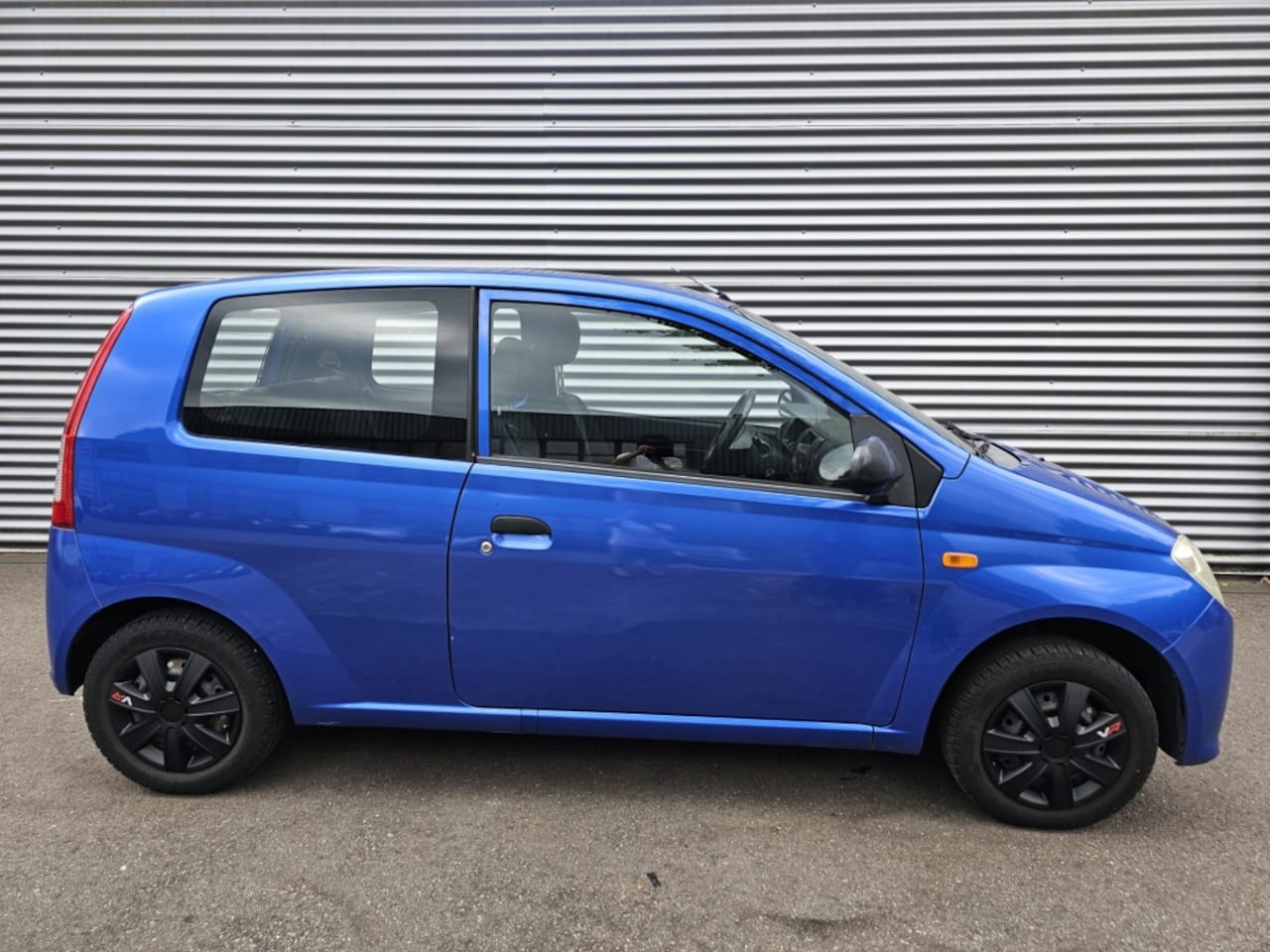 Daihatsu Cuore - 1.0-12V 100th Anniv. - AutoWereld.nl