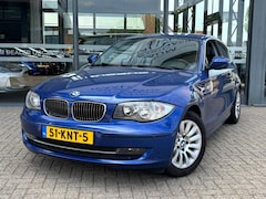 BMW 1-serie - 116I BUSINESS STYLE CARPLAY NAVI AIRCO PDC-CAMERA