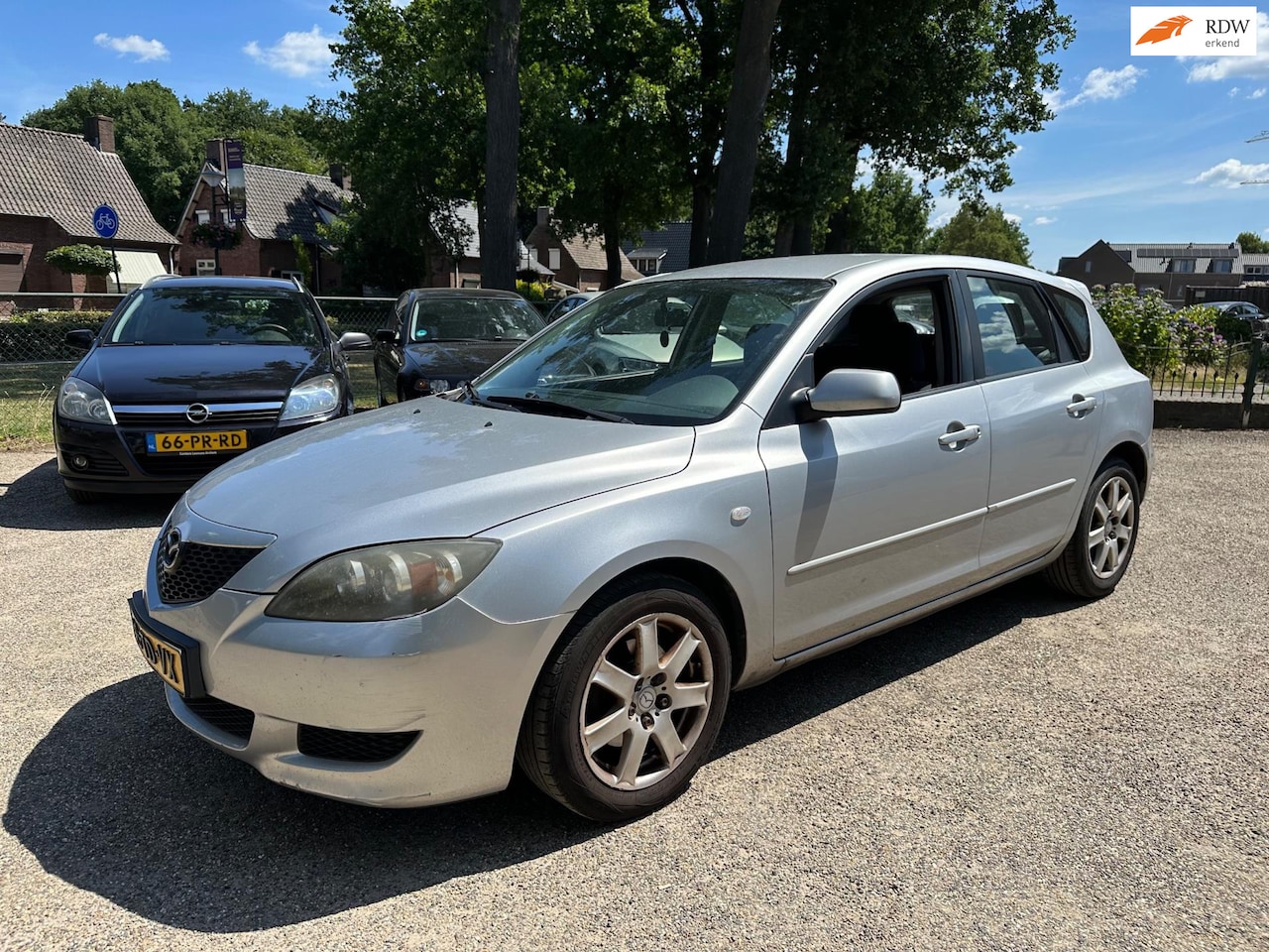 Mazda 3 Sport - 1.6 Touring airco - AutoWereld.nl