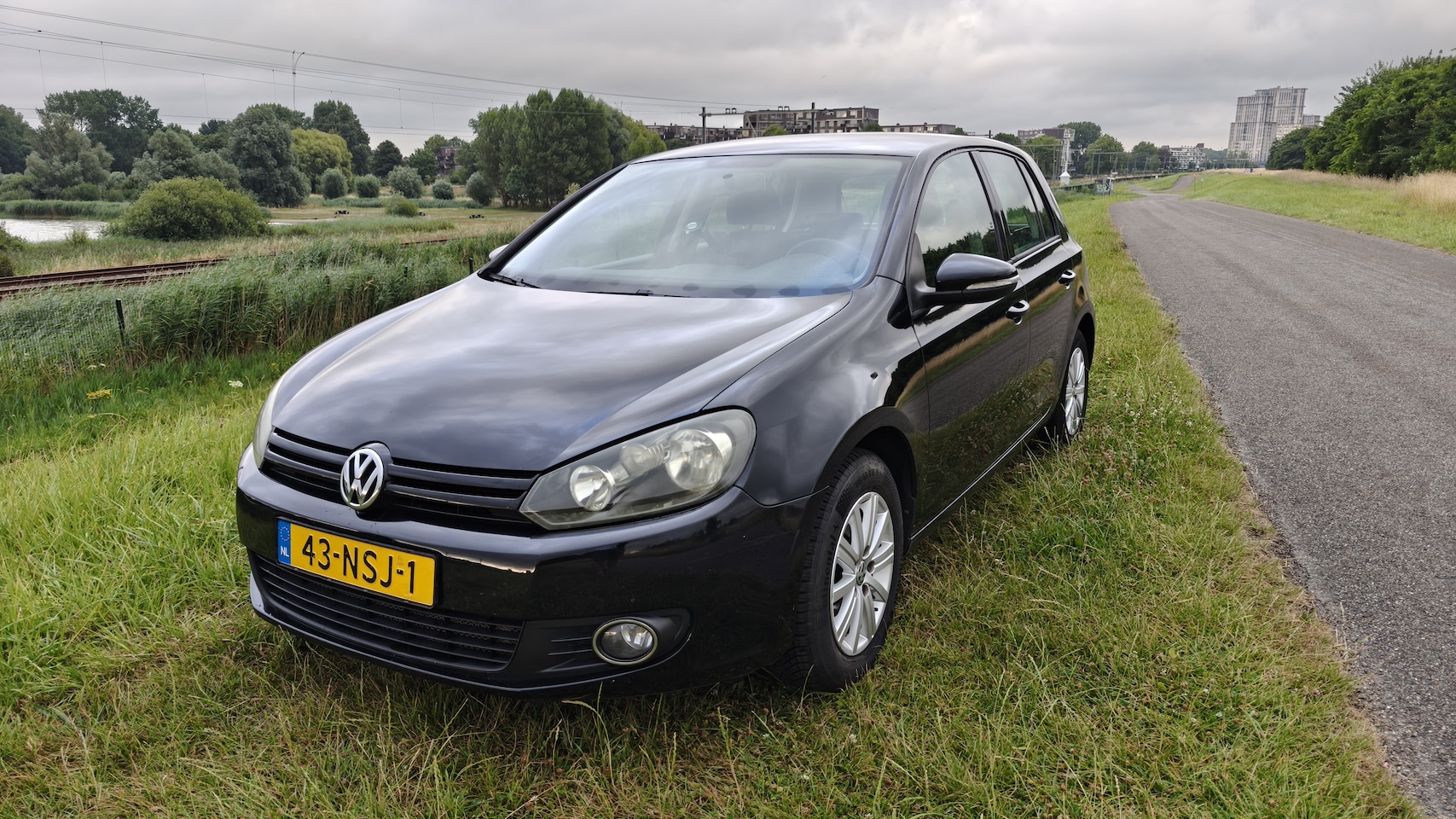 Volkswagen Golf - 1.2 TSI Tour II BlueMotion - AutoWereld.nl