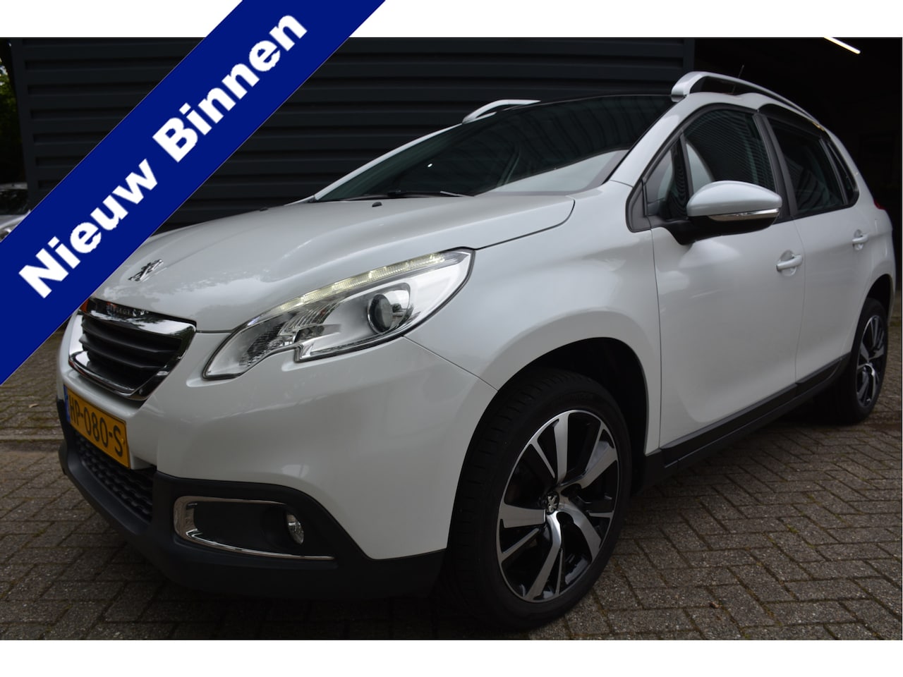 Peugeot 2008 - 1.2 Style Navi Clima Trekhaak - AutoWereld.nl