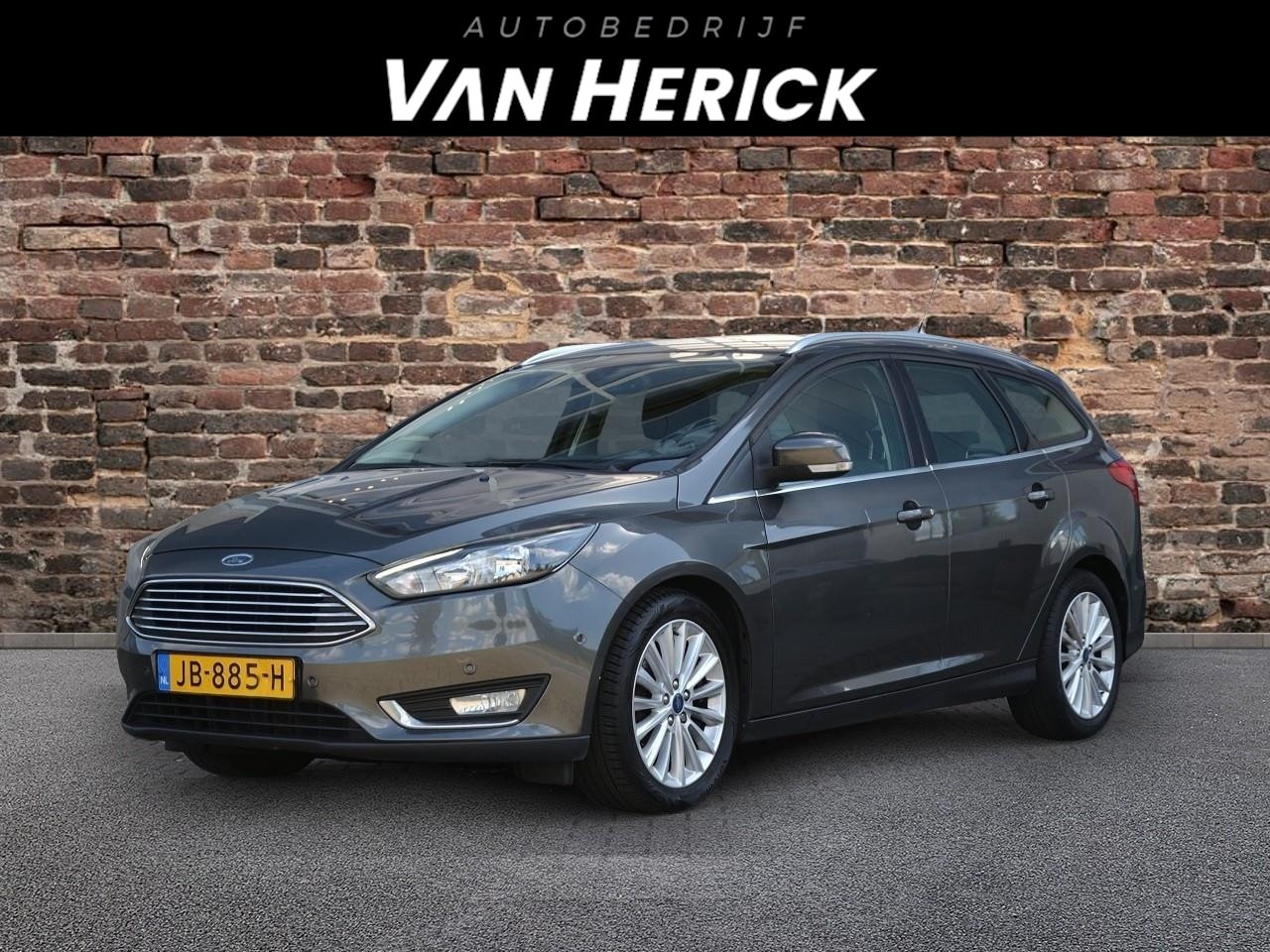 Ford Focus Wagon - 1.0 125PK Titanium | Navigatie | LM Velgen - AutoWereld.nl