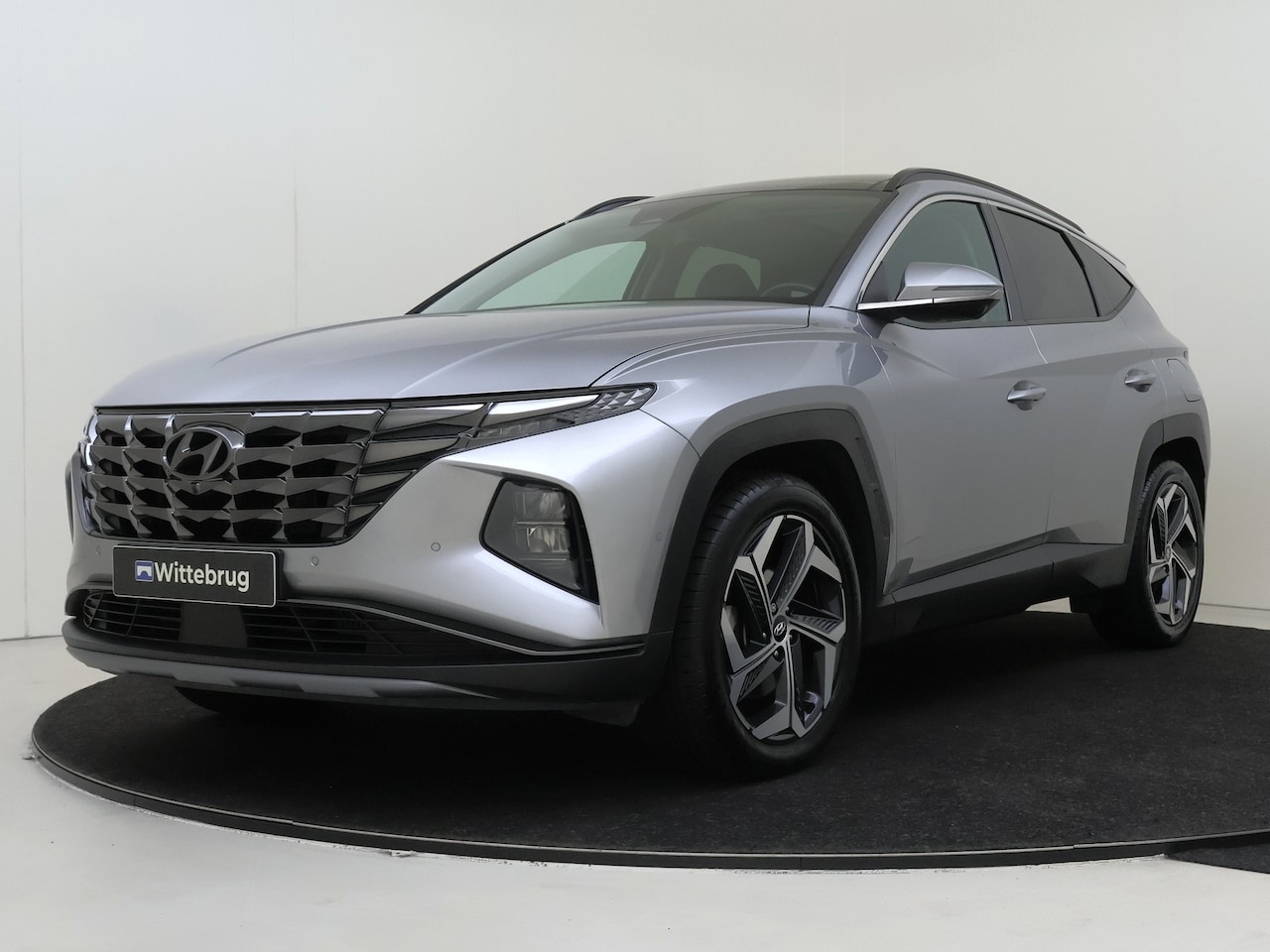 Hyundai Tucson - 1.6 T-GDI PHEV Premium Sky 4WD | Trekhaak | Panoramadak | Krell Audio | 360 Camera | Full - AutoWereld.nl