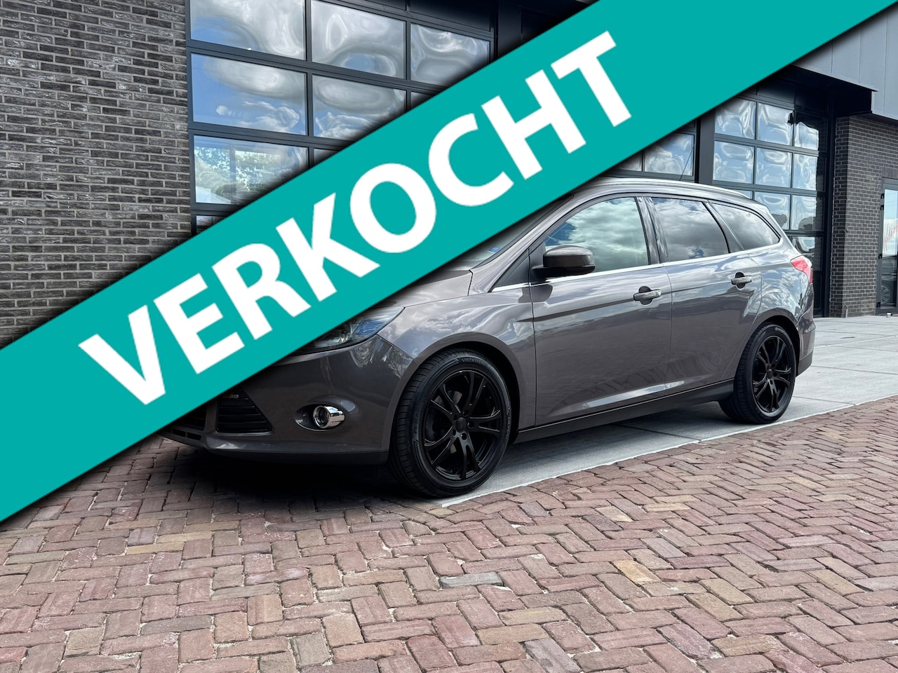 Ford Focus Wagon - 1.0 EcoBoost Titanium | Trekhaak | Navi | Clima | Cruise | - AutoWereld.nl