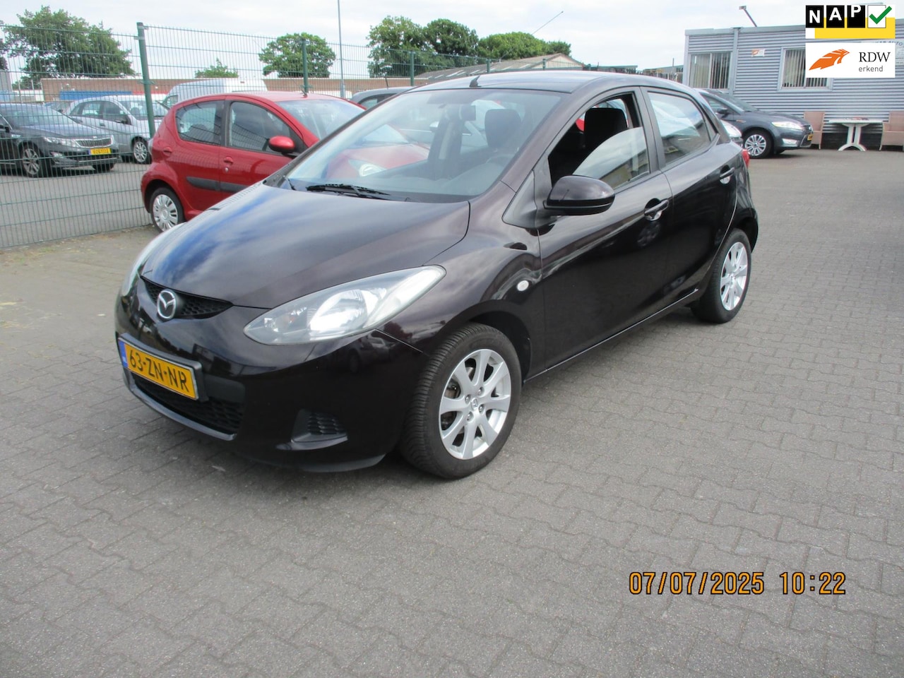 Mazda 2 - 2 1.3hp S-VT Touring 5 DRS-AIRCO - AutoWereld.nl