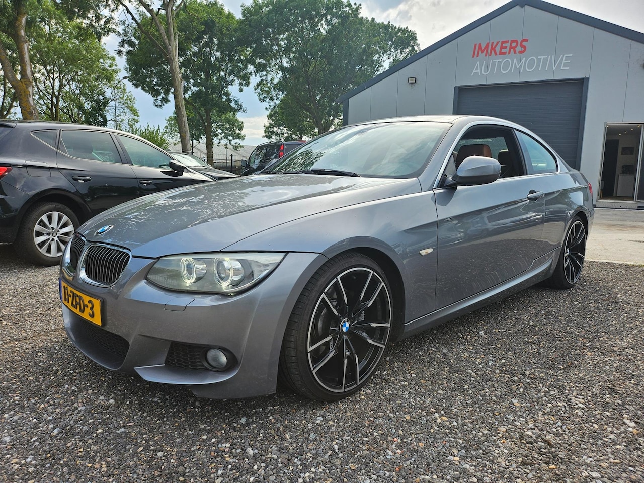 BMW 3-serie Coupé - 325i Business Line Sport AUT LEER NAVI - AutoWereld.nl
