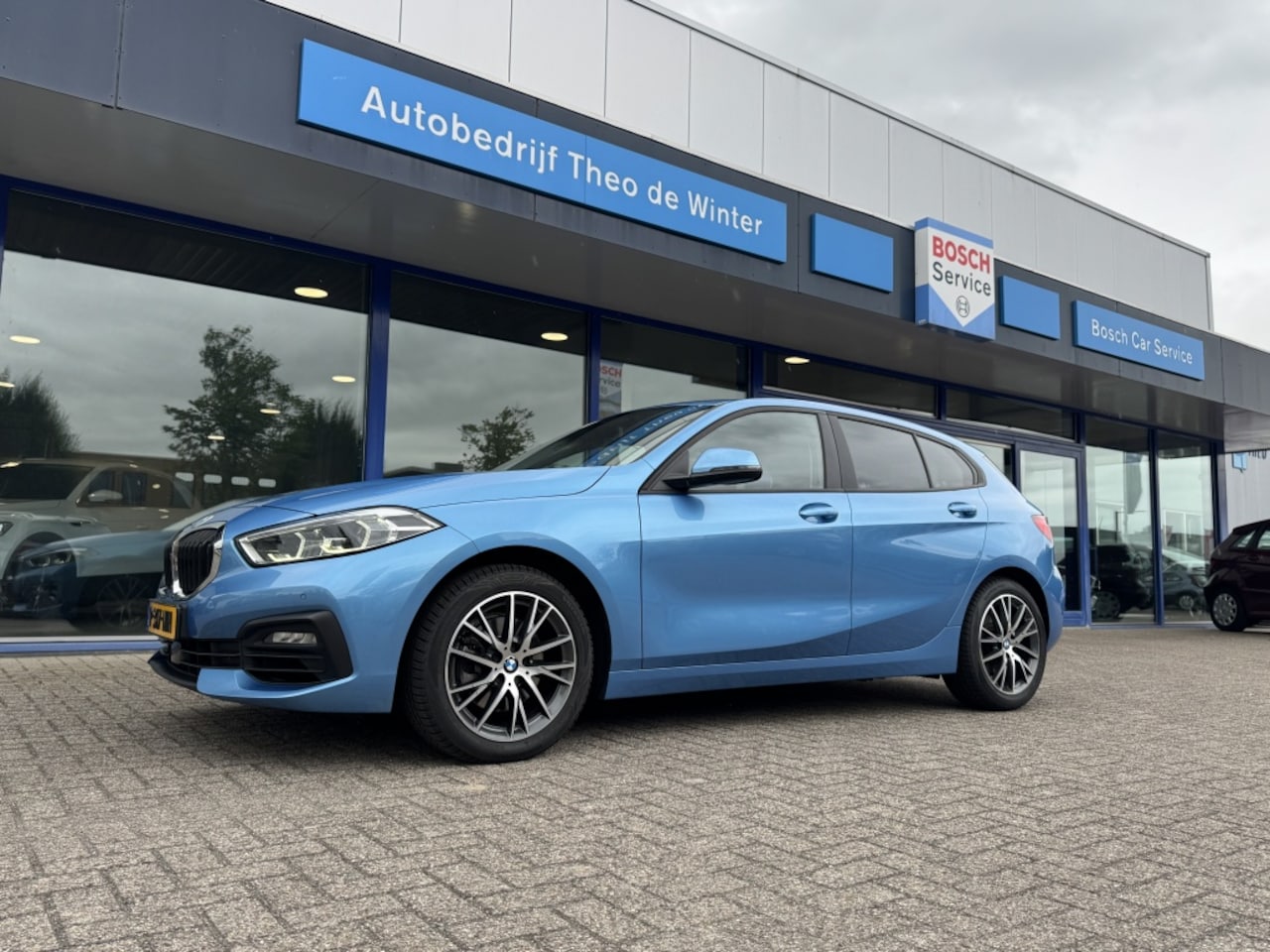 BMW 1-serie - 118i High Executive| Clima, Cruise, Carplay, Stoelverwarming, - AutoWereld.nl