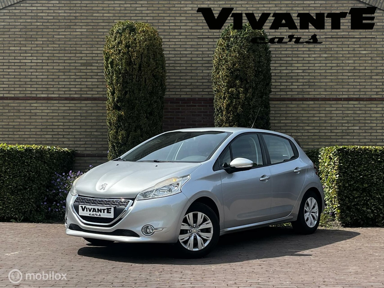 Peugeot 208 - 1.2 VTi Envy nieuwe.distri.riem*Cruise*Clima*PDC - AutoWereld.nl