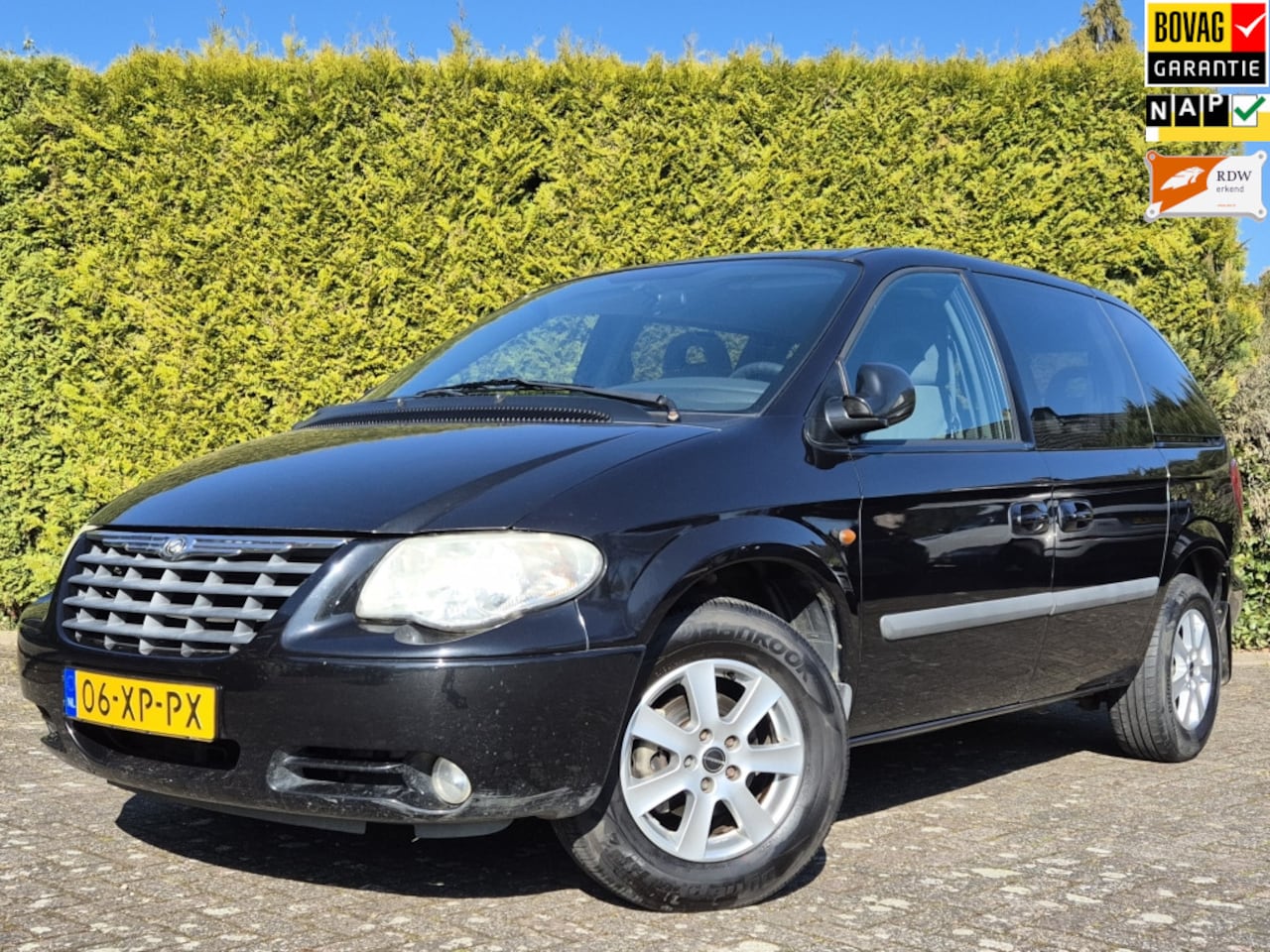 Chrysler Voyager - 7 Persoons | Airco | Cruise | Trekhaak - AutoWereld.nl